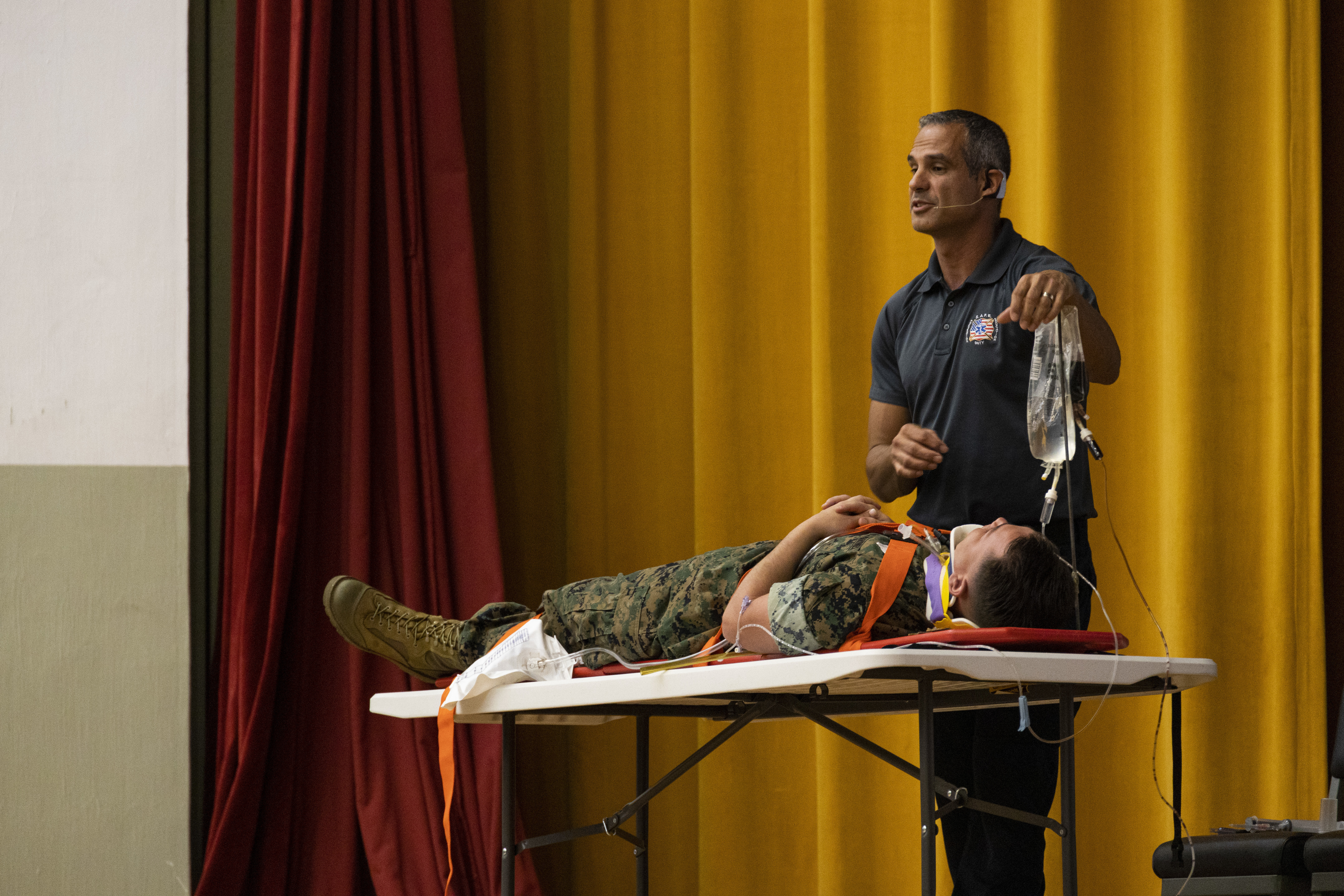 Oscar Duran, a firefighter paramedic and presenter with Florida’s Stay Alive from Education team, lists the injuries that can result from a car accident during a presentation on Camp Foster, Okinawa, Japan, Sept. 1, 2022. Presenters with Stay Alive from Education provided “Street Smart” training to Marines to raise awareness of the consequences of unsafe driving. The SAFE team is a group of firefighters and paramedics that performed an interactive presentation to educate audiences on car accident scenarios. (U.S. Marine Corps photo by Lance Cpl. Thomas Sheng)