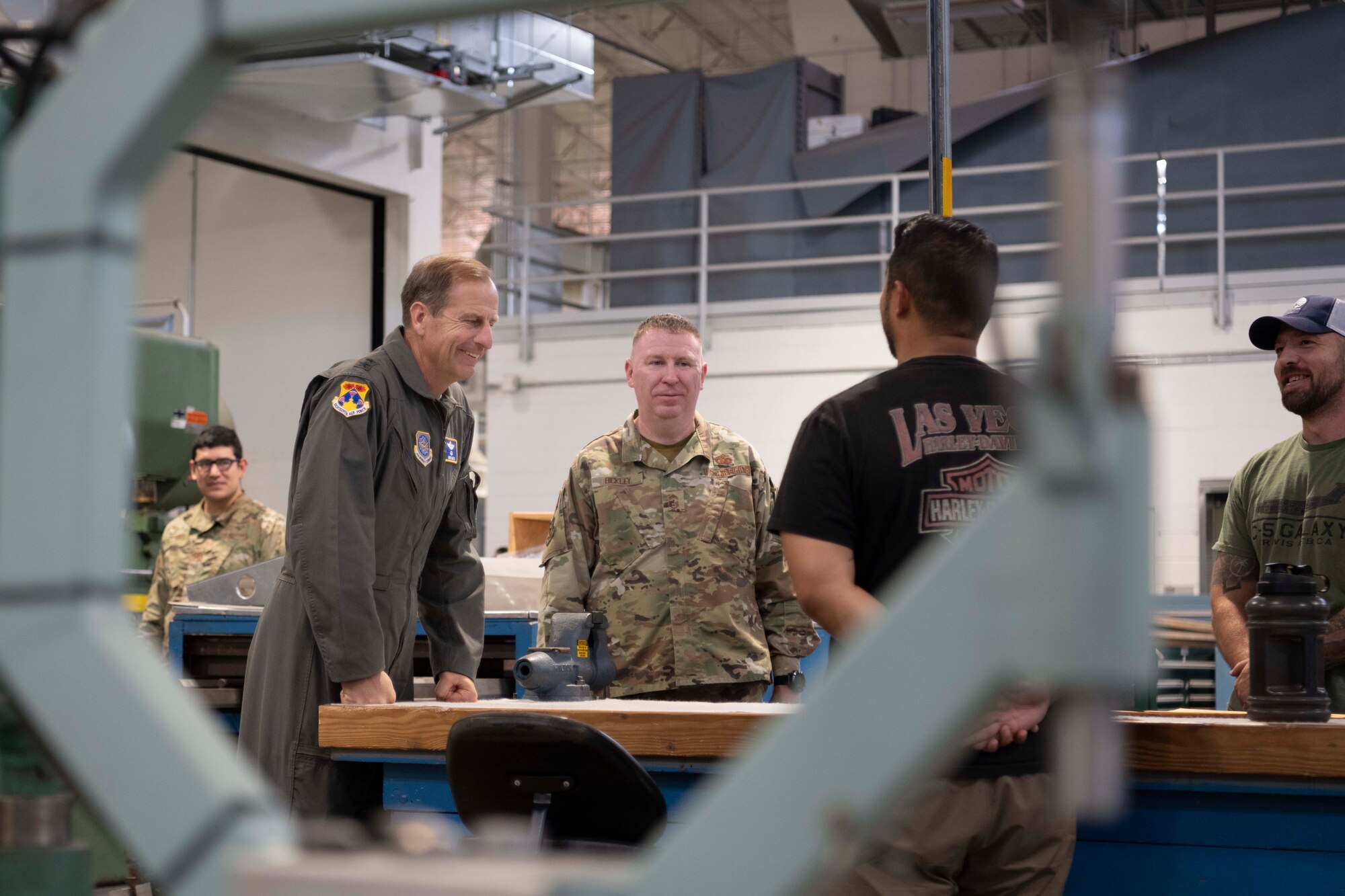 Airmen hold a conversation.