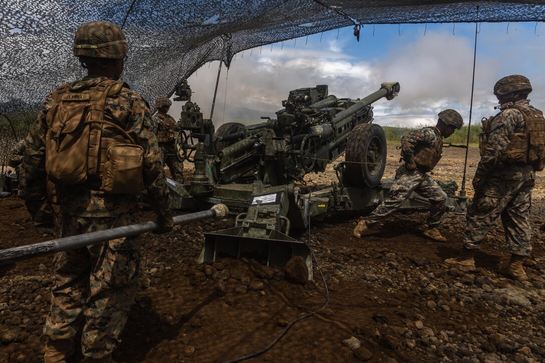 U.S. Marines with  Charlie Company, 3d Battalion, 12th Marines, 3d Marine Division fire an M777 howitzer during Artillery Relocation Training Program 22.2 at the Combined Arms Training Center, Camp Fuji, Japan, Aug. 29, 2022.