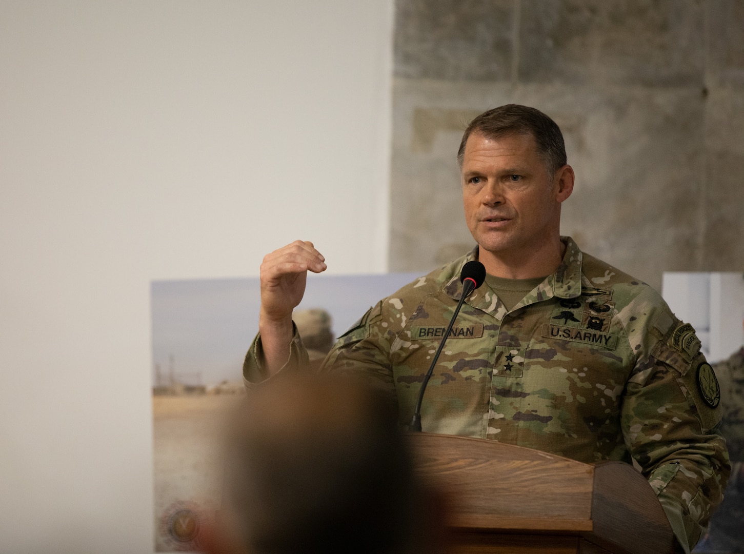 U.S. Army Maj. Gen. John W. Brennan, outgoing commander of Combined Joint Task Force - Operation Inherent Resolve, speaks during a transfer of authority ceremony at Baghdad, Iraq, Sept. 8, 2022. CJTF-OIR remains steadfast in its commitment to support partner forces in designated areas of Iraq and Syria as they secure the enduring defeat of Da’esh and prevent the group’s reemergence. (U.S Army photo by Sgt. Julio Hernandez)