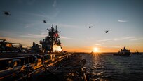 (Sep. 4, 2022) U.S. Navy and Marine Corps aircraft fly over the Wasp-class amphibious assault ship USS Kearsarge (LHD 3), during a maneuvering exercise with partner and allied ships in the Baltic Sea, Sep. 4, 2022. The Kearsarge Amphibious Ready Group and embarked 22nd Marine Expeditionary Unit, under the command and control of Task Force 61/2, is on a scheduled deployment in the U.S. Naval Forces Europe area of operations, employed by U.S. Sixth Fleet to defend U.S., allied and partner interests. (U.S. Navy photo by Mass Communication Specialist 3rd Class Taylor Parker)