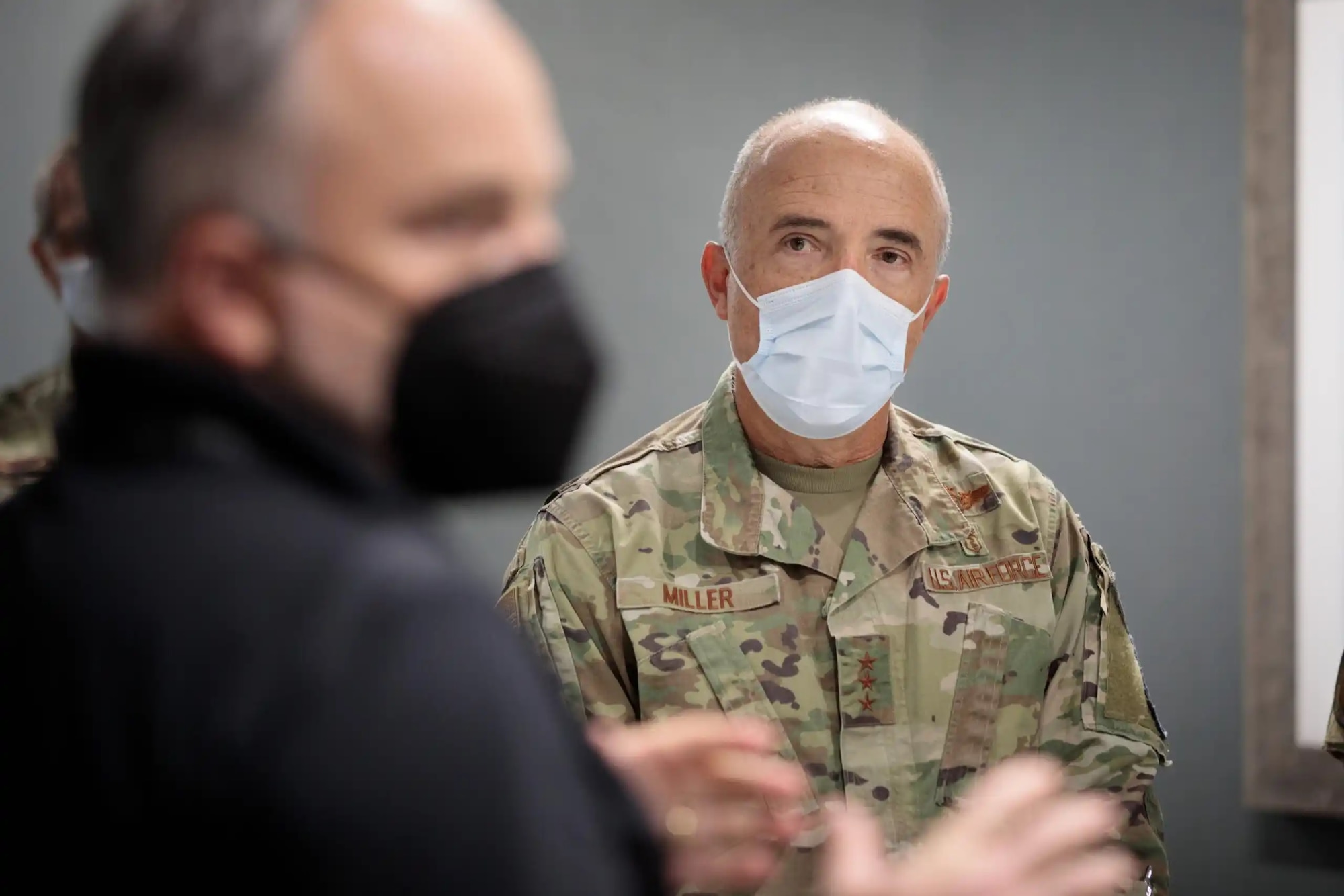 Image of an Airman listening.