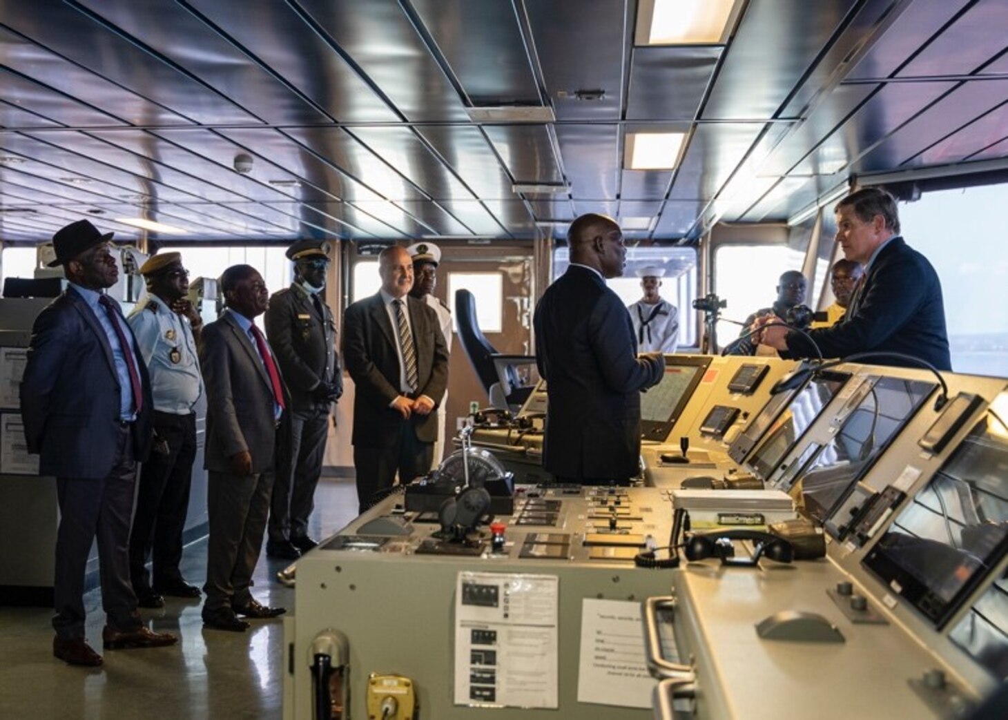 Sep. 12, 2022) Joseph Dark, right, ship's master, briefs Republic of Congo senior military leaders, embassy staff and dignitaries during a tour aboard the Lewis B. Puller-class expeditionary sea base USS Hershel "Woody" Williams (ESB 4), Sep. 12, 2022. Hershel "Woody" Williams is rotationally deployed to the U.S. Naval Forces Africa area of operations, employed by U.S. Sixth Fleet, to defend U.S., allied and partner interests.