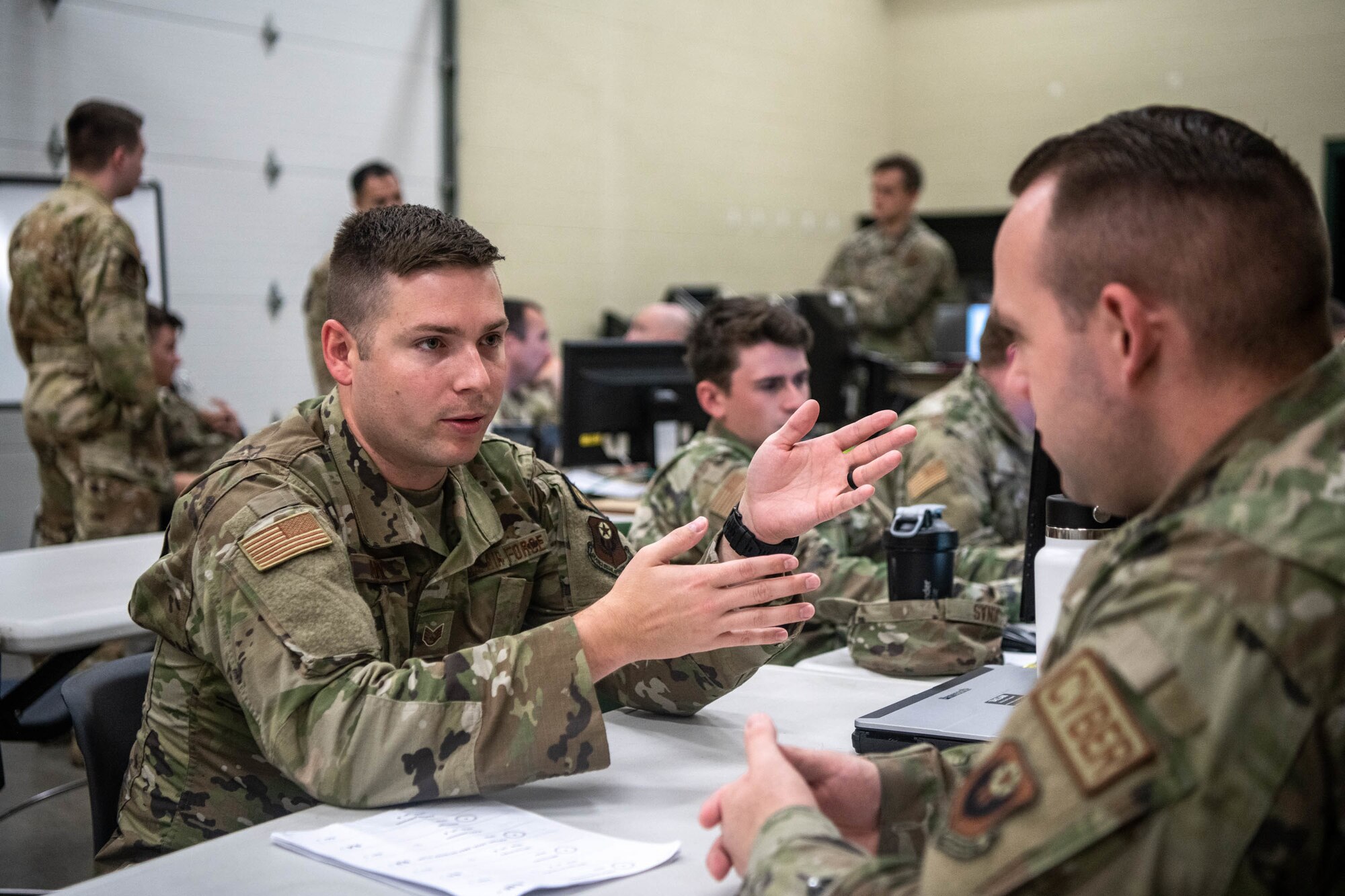 men work in operations center