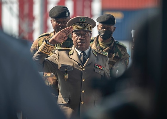 (Sep. 12, 2022) Armed Forces of the Republic of Congo Gen. Jean Olessongo Ondaye, military and defense zone commander, is welcomed aboard the Lewis B. Puller-class expeditionary sea base USS Hershel "Woody" Williams (ESB 4), Sep. 12, 2022. Hershel "Woody" Williams is rotationally deployed to the U.S. Naval Forces Africa area of operations, employed by U.S. Sixth Fleet, to defend U.S., allied and partner interests.
