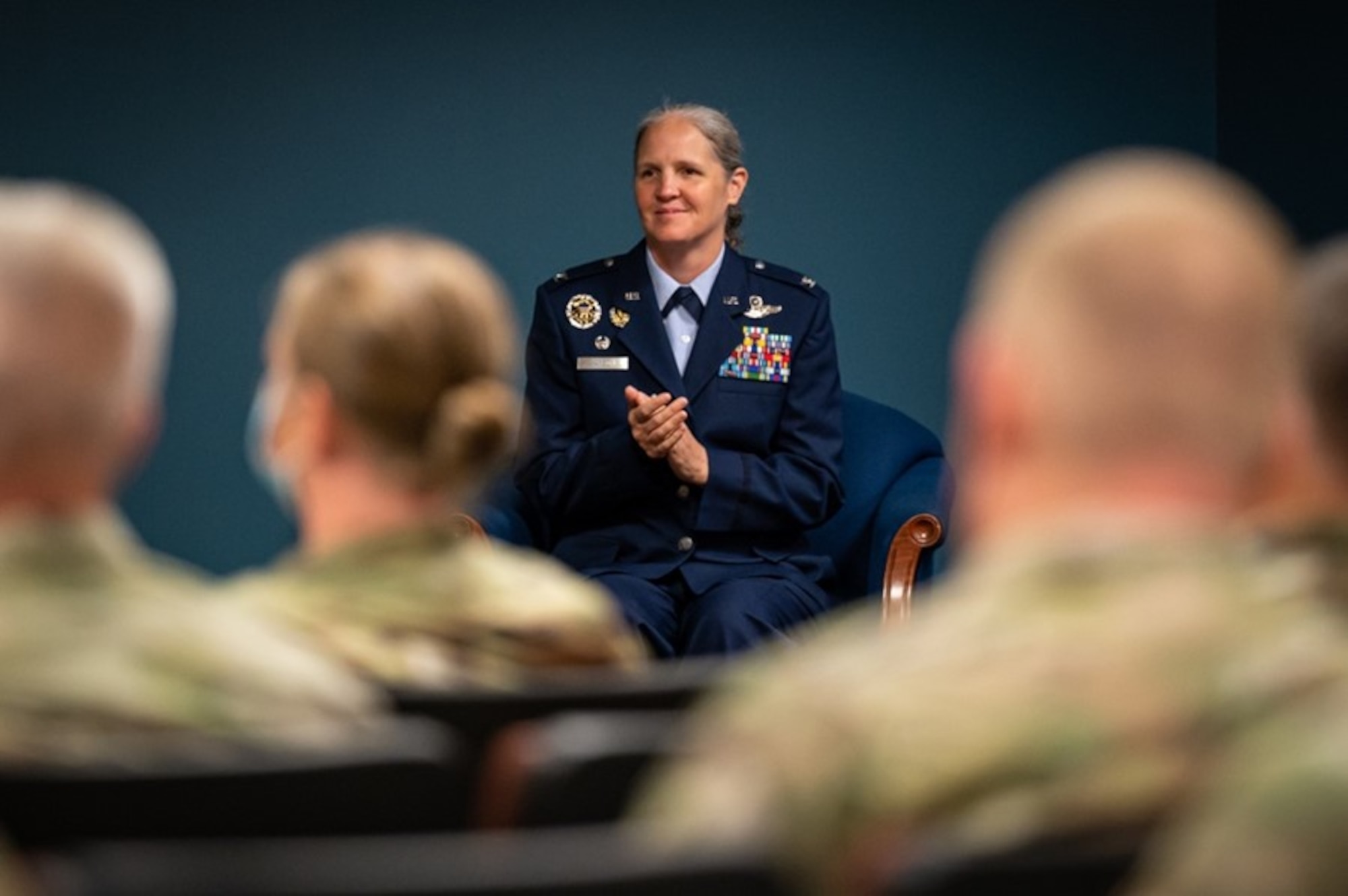 U.S. Air Force Col. Elizabeth Hanson, 305th Air Mobility Wing commander and the 911th Air Refueling Squadron’s wing commander, applauds during the 911th ARS’s assumption of command ceremony at Seymour Johnson Air Force Base, North Carolina, Sept. 9, 2022. The squadron is the Air Force's very first active-duty squadron that is under the command of a reserve wing.