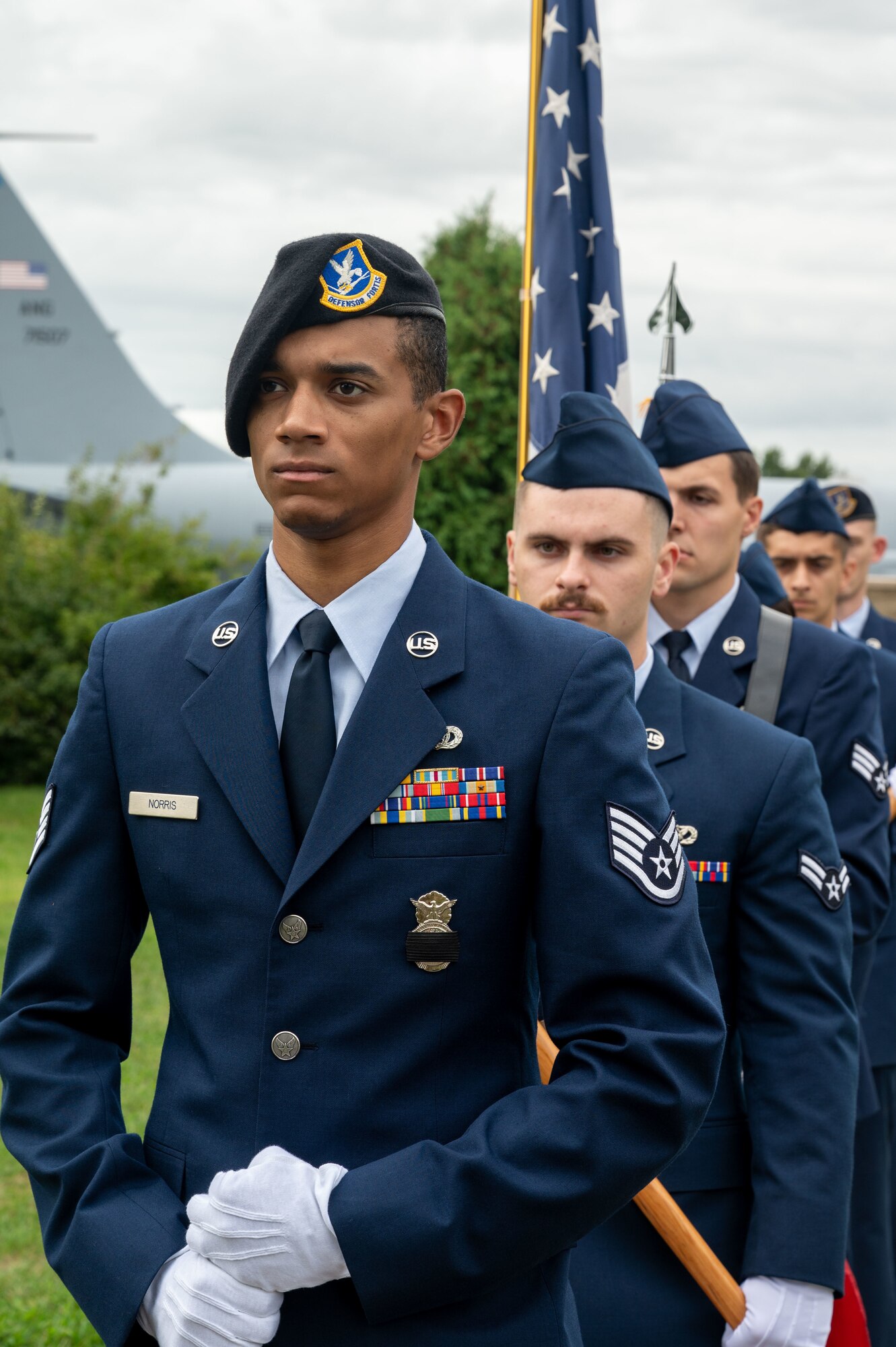 Members of Team Dover wait to present colors during the 21st Anniversary 9/11 Memorial Ceremony held at the Air Mobility Command Museum on Dover Air Force Base, Delaware, Sept. 11, 2022. The base hosted the ceremony to remember and honor those who perished in the attacks on Sept. 11, 2001. (U.S. Air Force photo by Senior Airman Cydney Lee)