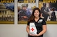 Sarah Houck, Services to the Armed Forces branch of the Red Cross, senior regional program specialist, displays a Red Cross gift bag at Joint Base Langley-Eustis, Virginia, Sept. 13, 2022