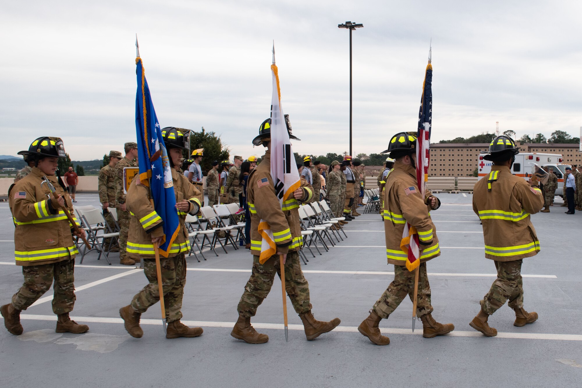 Base honor guard members prepare to present colors during a 9/11 Remembrance Ceremony at Osan Air Base, Republic of Korea, Sept. 10, 2022.