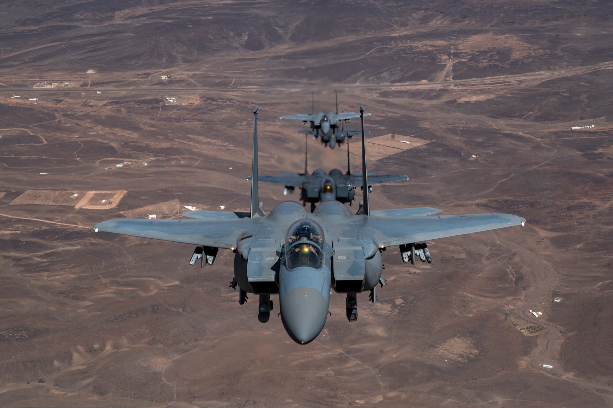 U.S. Air Force F-15E Strike Eagles, assigned to the 335th Expeditionary Fighter Squadron, fly alongside Saudi Arabian Air Force F-15E Strike Eagles during Operation Agile Spartan III within the U.S. Central Command area of responsibility, Sep. 5, 2022. OAS III tested Ninth Air Force (Air Forces Central)’s ability to execute rapid troop and equipment movement to and from dispersed locations around the U.S. Central Command area of responsibility region. This kind of joint training enhances international partnership and interoperability in the interest of regional security. (U.S. Air Force photo by Staff Sgt. Christian Sullivan)