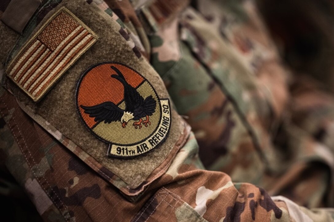 A 911th Air Refueling Squadron patch worn at Seymour Johnson Air Force Base, North Carolina, Sept. 9, 2022. The squadron is the Air Force's very first active-duty squadron that is under the command of a reserve wing.