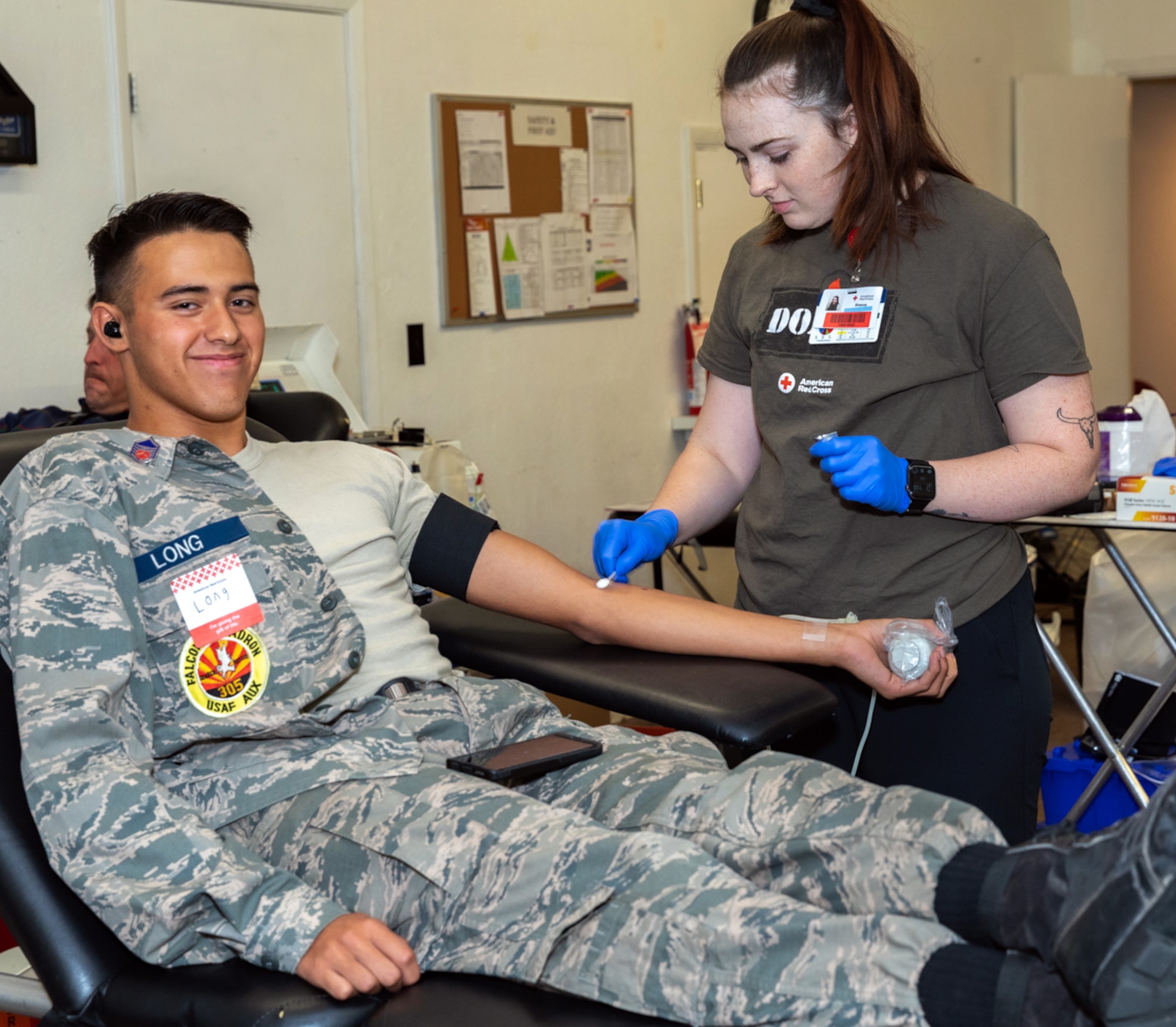 Cadet Master Sgt. Jayden Long is shown making a blood donation.