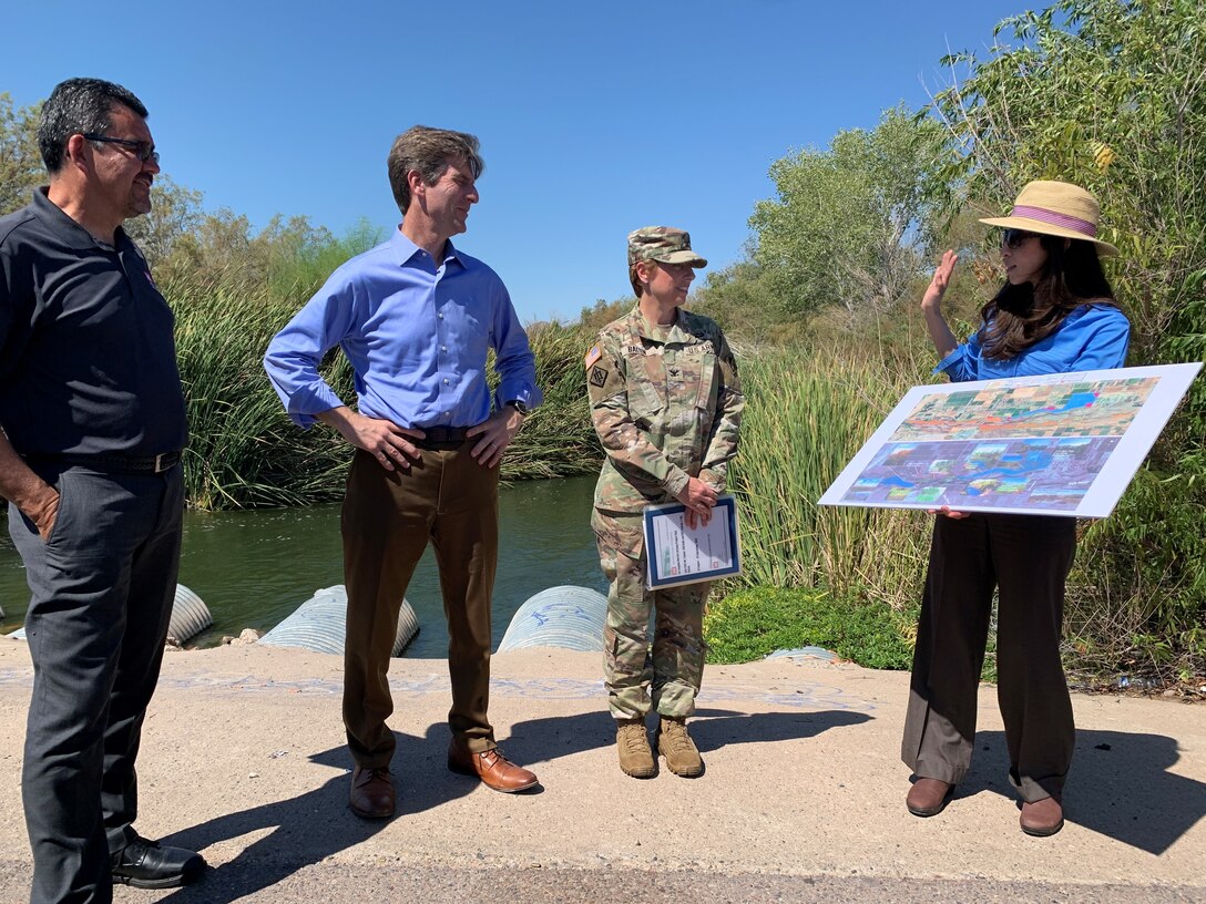 Assistant Secretary of the Army for Civil Works Michael Connor; Congressional Representative Greg Stanton, Arizona; Los Angeles District Commander Col. Julie Balten; and LA District Project Manager Claudia Garcia discuss the Tres Rios Aquatic Restoration project Sept. 1 site visit to the Tres Rios Wetlands in Phoenix. Once completed, the project will restore an aquatic ecosystem, increase recreational park space and support flood mitigation in central Arizona. (Photo by Robert DeDeaux, Los Angeles District PAO)