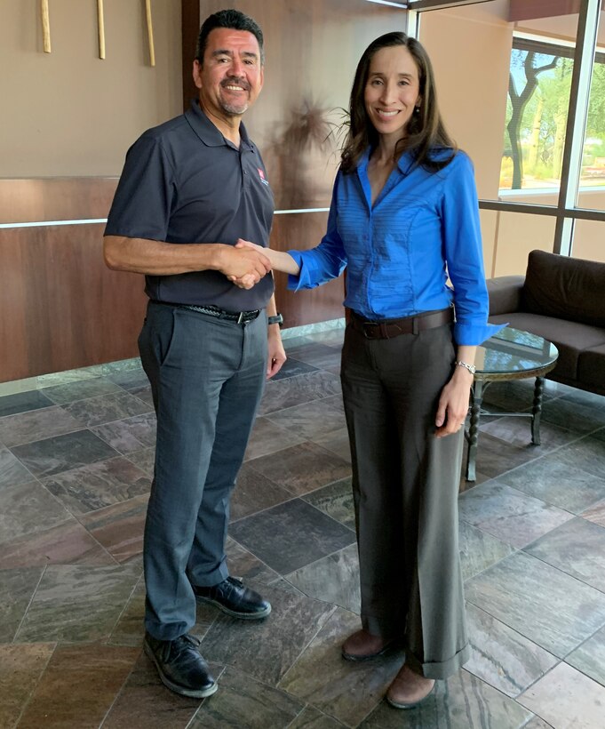 Assistant Secretary of the Army for Civil Works Michael Connor presents a coin for excellence to Los Angeles District Project Manager Claudia Garcia during a visit to the Gila River Reservation Sep. 1 at the Wild Horse Pass Corporate Center near Phoenix. Garcia was recognized for her dedicated efforts on several flood-risk mitigation and aquatic restoration projects throughout Arizona. Connor serves as the principal advisor to the Secretary of the Army on all matters related to the Army’s Civil Works Program. (Photo by Robert DeDeaux, Los Angeles District PAO)