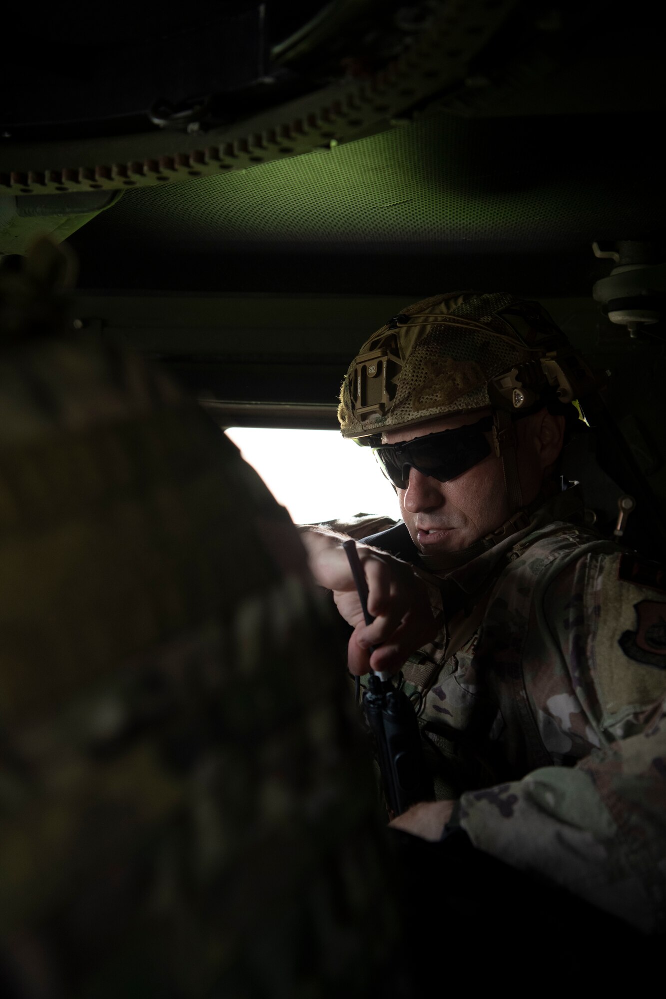 U.S. Air Force Senior Airman Joseph Plato, 8th Civil Engineer Squadron explosive ordnance disposal (EOD) technician, sets up a radio during a training event at Kunsan Air Base, Republic of Korea, Sept. 12, 2022. After being notified of the vehicle-borne improvised explosive device (VBIED), the EOD team unit set up a cordon to keep personnel at a safe distance as they disarmed the VBIED. (U.S. Air Force photo by Staff Sgt. Sadie Colbert)