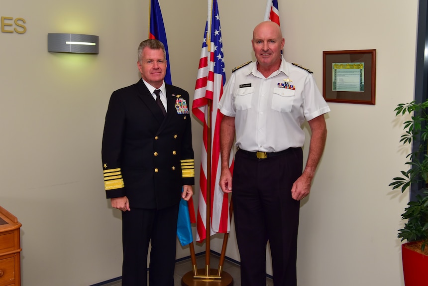 Adm. Samuel Paparo meets with Rear Admiral James Gilmour.