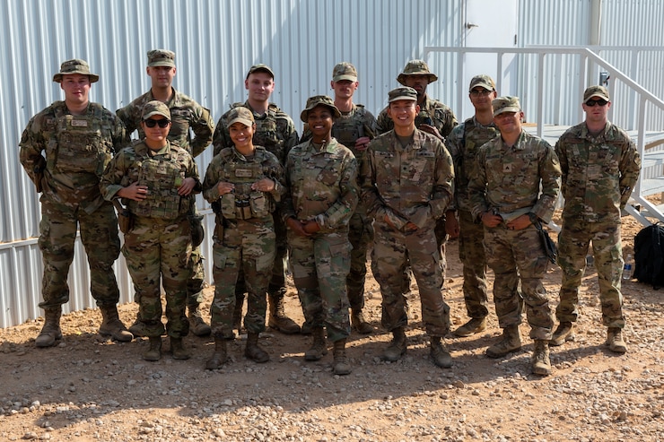U.S. Air Force Airmen and Army Soldiers assigned to the 378th Air Expeditionary Wing's Base Area Defense Crew, (BADC), pose for a photo, Sept. 10, 2022, at Prince Sultan Air Base, Kingdom of Saudi Arabia.