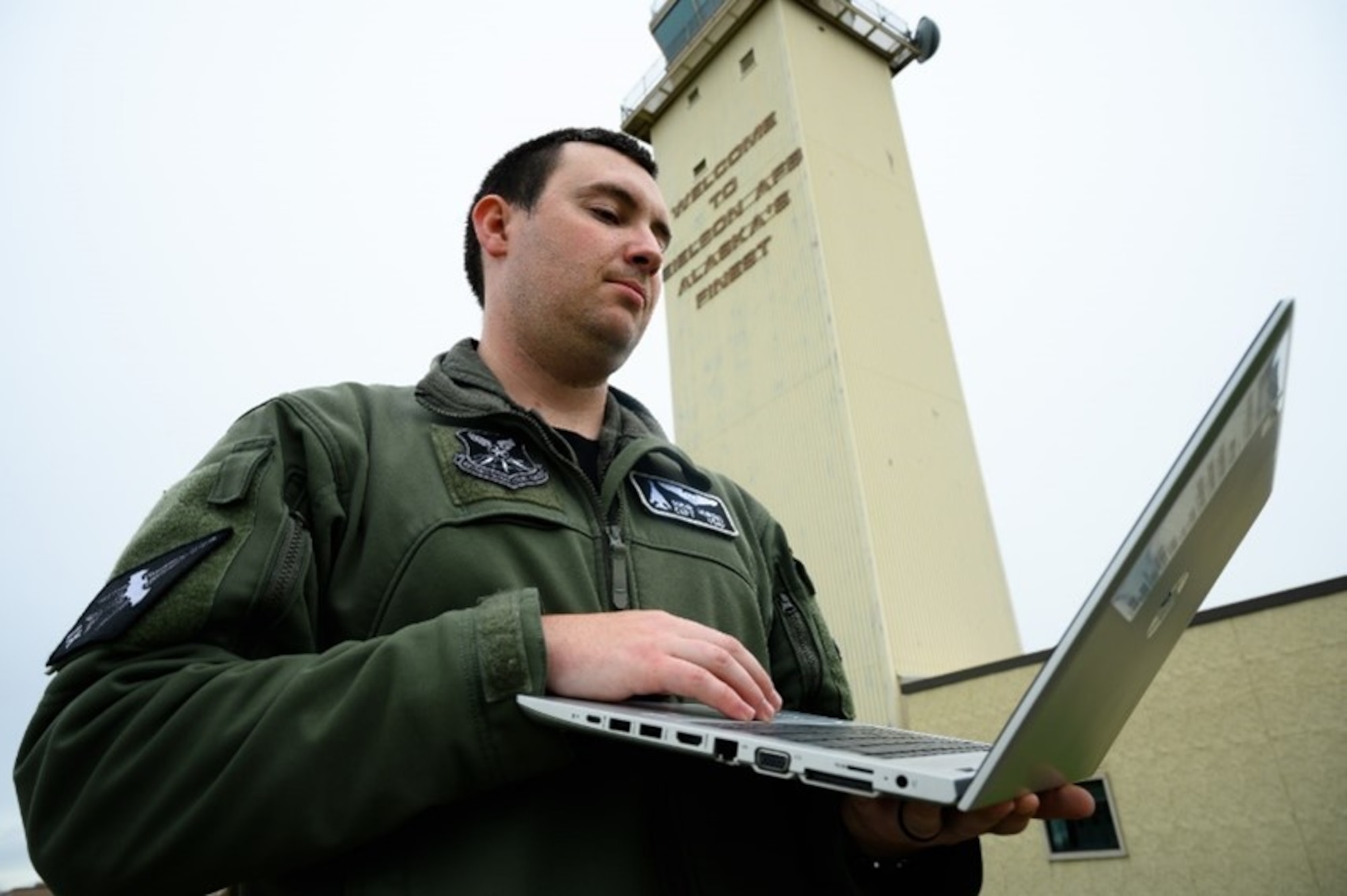 U.S. Air Force Capt. Ryan Gorski, a 9th Bomb Squadron B-1 pilot, sets up a communications flyaway kit on Eielson Air Force Base, Alaska, Sept. 9, 2022. The communications flyaway kit utilizes SpaceX’s Starlink service which provides commercial internet and connectivity to support bomber task force missions at austere locations. (U.S. Air Force photo by Senior Airman Jose Miguel T. Tamondong)