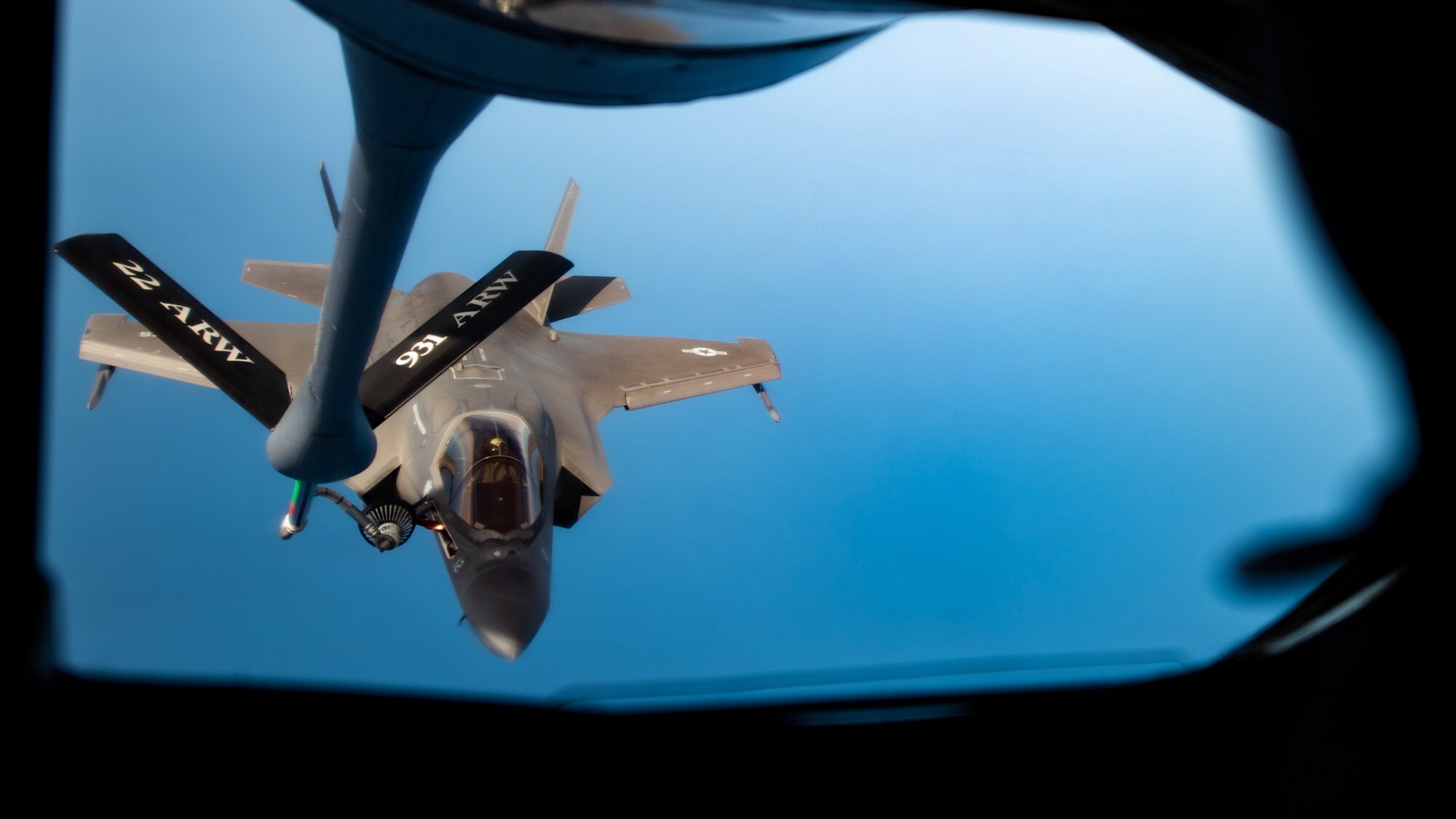 A U.S. Marine Corps F-35B Lightning II, assigned to Marine Fighter Attack Squadron 121, and U.S. Air Force KC-135 Stratotanker practice quick-maneuver, in-flight refueling over the Pacific Ocean, Sept. 9, 2022. The U.S. can operate from the sanctuary of bases across the Indo-Pacific region, increasing interoperability and lethality. (U.S. Air Force photo by Senior Airman Gary Hilton)