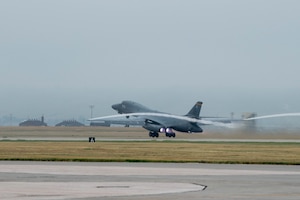A U.S. Air Force B-1B Lancer assigned to the 37th Bomb Squadron takes off from Ellsworth Air Force Base, S.D., to integrate with the U.S. Navy and rapidly deploy a naval mine during a live-fire mine exercise (MineX) Aug. 25, 2022. Ellsworth integrated with the Navy to provide training for weapon loaders in handling and loading naval mines. B-1B Lancers are capable of deploying more than seven battlefield-shaping Mark-65 Quickstrike mines. (U.S. Air Force photo by Senior Airman Quentin K. Marx)