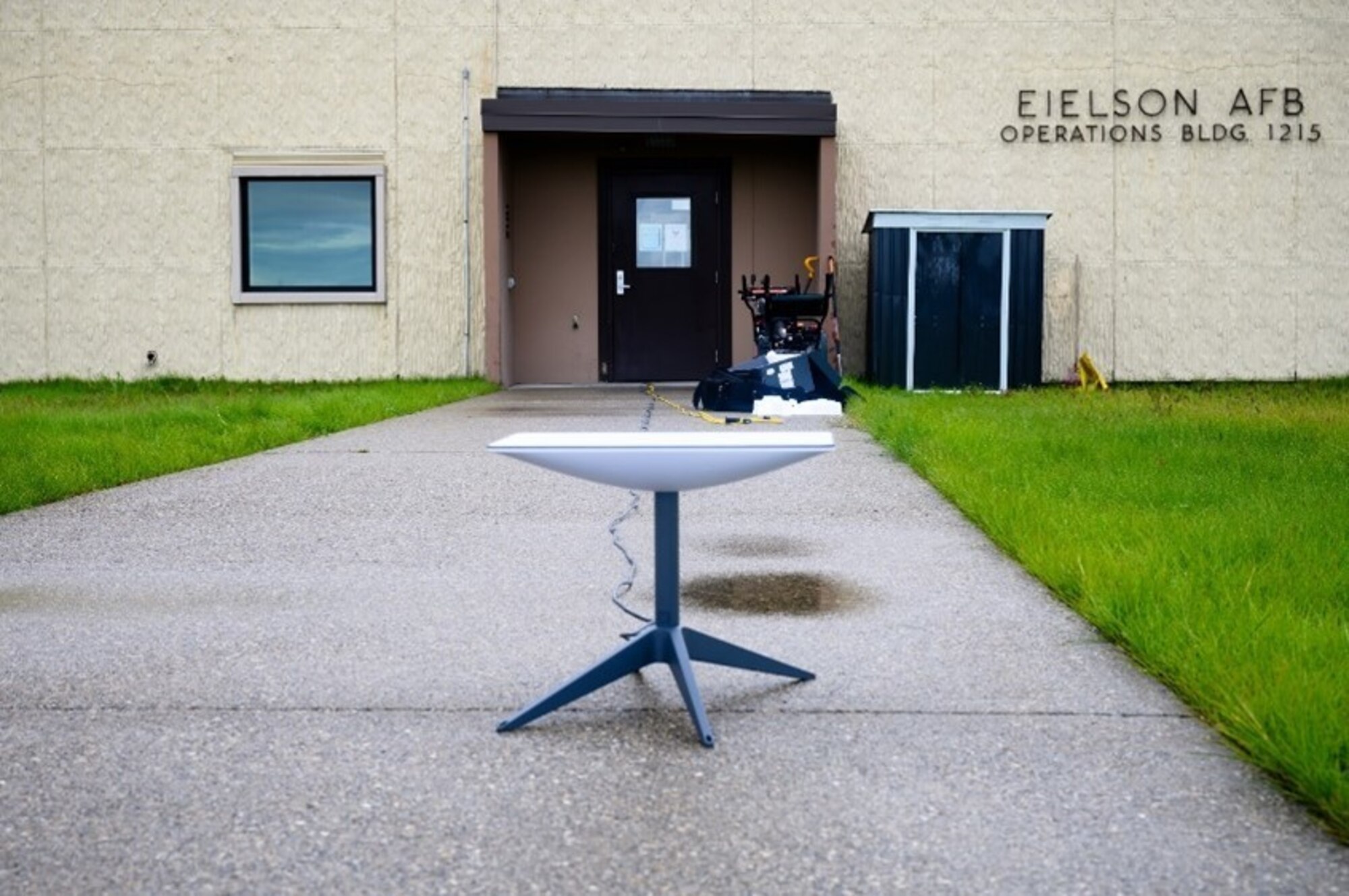 A communications flyaway kit sits in front of the base operations center at Eielson Air Force Base, Alaska, Sept. 9, 2022. The communications flyaway kit, conceptualized in collaboration with the 7th Communication Squadron, 7th Weapons Squadron, and the 9th Bomb Squadron, utilizes SpaceX’s Starlink service which provides commercial internet and connectivity to support bomber task force missions at austere locations. (U.S. Air Force photo by Senior Airman Jose Miguel T. Tamondong)