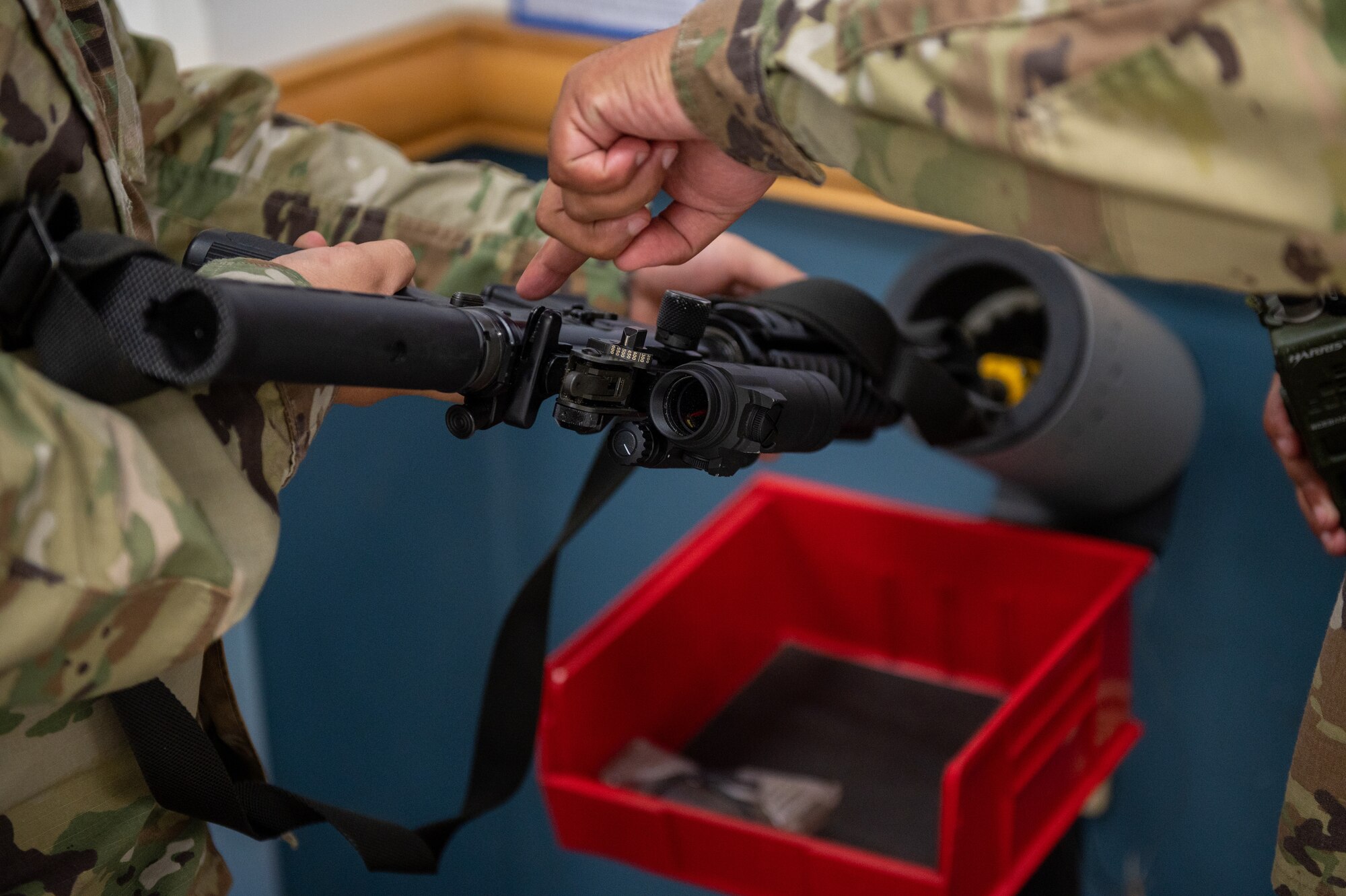 The safety mechanism on an M-4 Carbine is checked during an augmentee recall