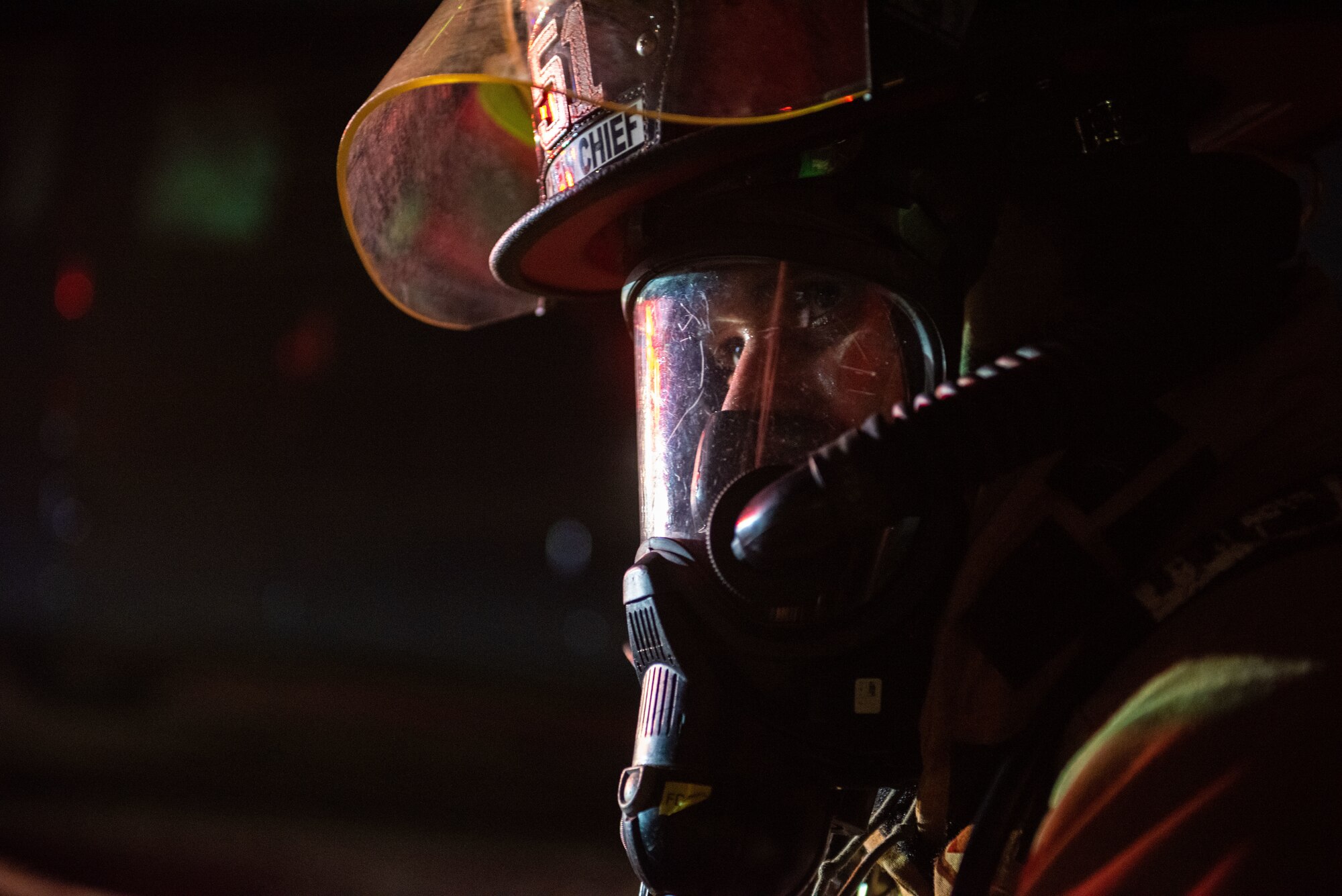 U.S. Air Force Staff Sgt. Benny Bowen, 51st Civil Engineer Squadron lead firefighter, waits for further directions during a fire response scenario at Osan Air Base, Republic of Korea, Sept. 12, 2022, in support of a wing training event.