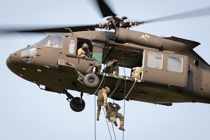 U.S. Army Soldiers conduct rappel operations from a UH-60 Black Hawk as part of the Air Assault course at Camp Dodge in Johnston, Iowa, Sept. 8, 2022.