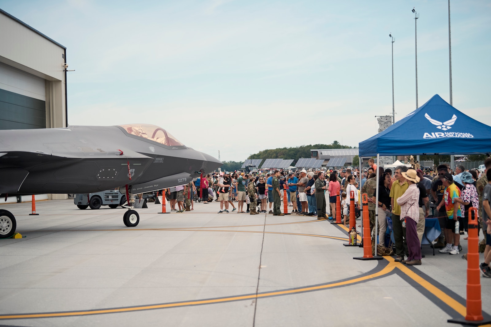Photo of more than 6,000 visitors at the open house hosted by the Vermont Air and Army National Guard, where military aviation, equipment, vehicles, munitions and flight simulators were on display, along with a career fair, musical performances and police dog demonstrations, at the Vermont Air National Guard Base, South Burlington, Vermont, Sept. 11, 2022.