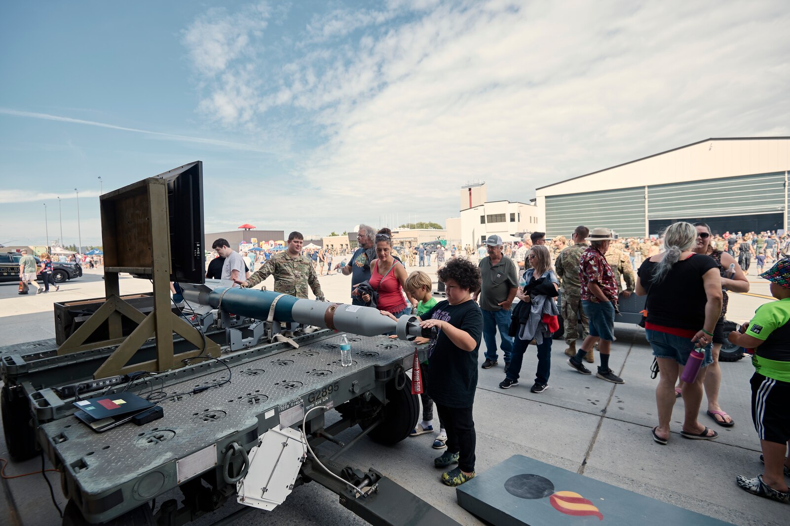 Photo of more than 6,000 visitors at the open house hosted by the Vermont Air and Army National Guard, where military aviation, equipment, vehicles, munitions and flight simulators were on display, along with a career fair, musical performances and police dog demonstrations, at the Vermont Air National Guard Base, South Burlington, Vermont, Sept. 11, 2022.