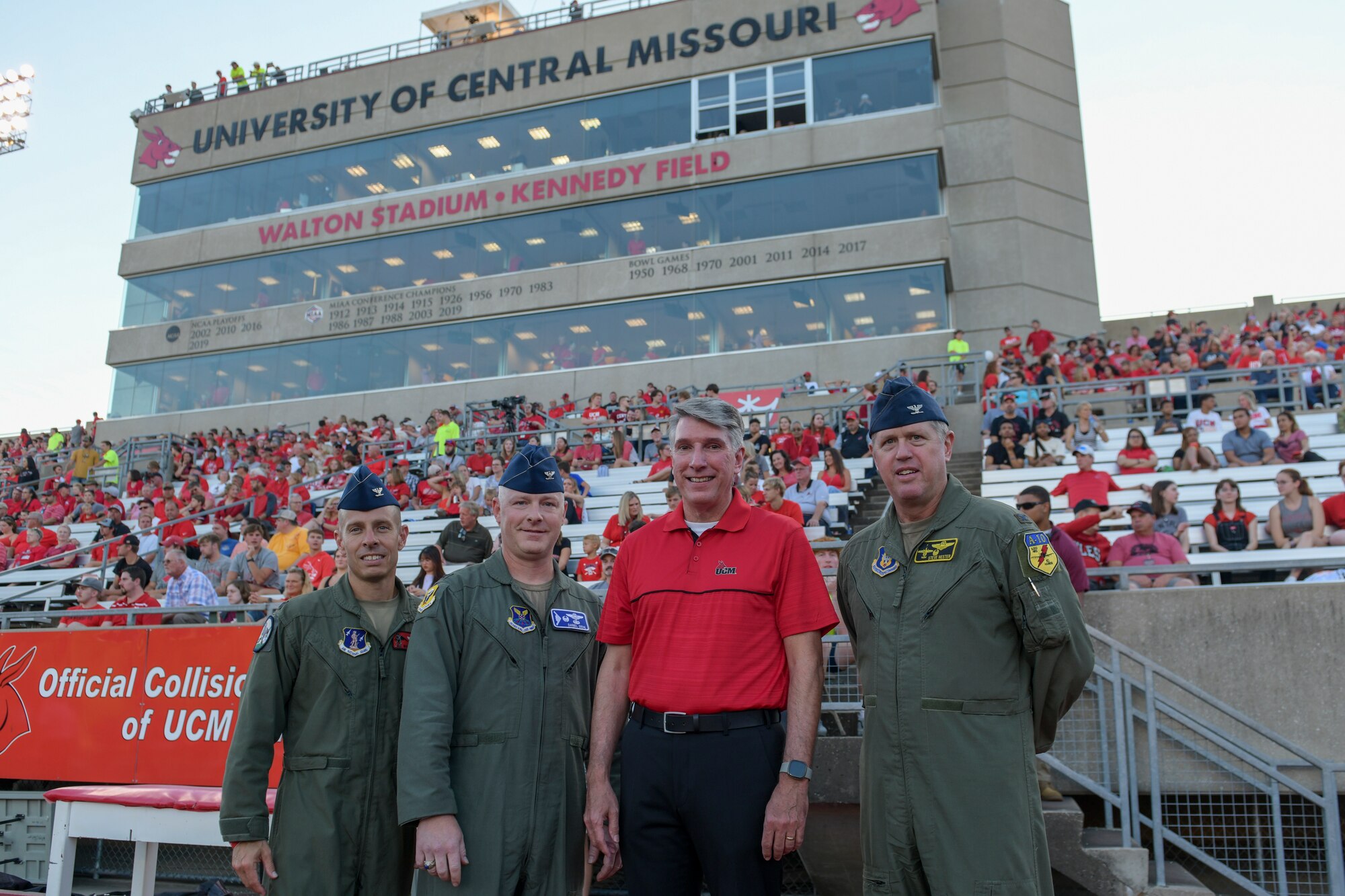 Whiteman Air Force Base wing commanders from the 509th and 131st Bomb Wings and the 442nd Fighter Wing, pose for a photo with Dr. Roger Best, University of Central Missouri president, prior to the UCM Military Appreciation football game, Sept. 8, 2022, in Warrensburg, Missouri. Whiteman AFB and UCM share a valuable community partnership that fosters a supportive relationship between the base and local communities. (U.S. Air Force photo by Tech. Sgt. Dylan Nuckolls)