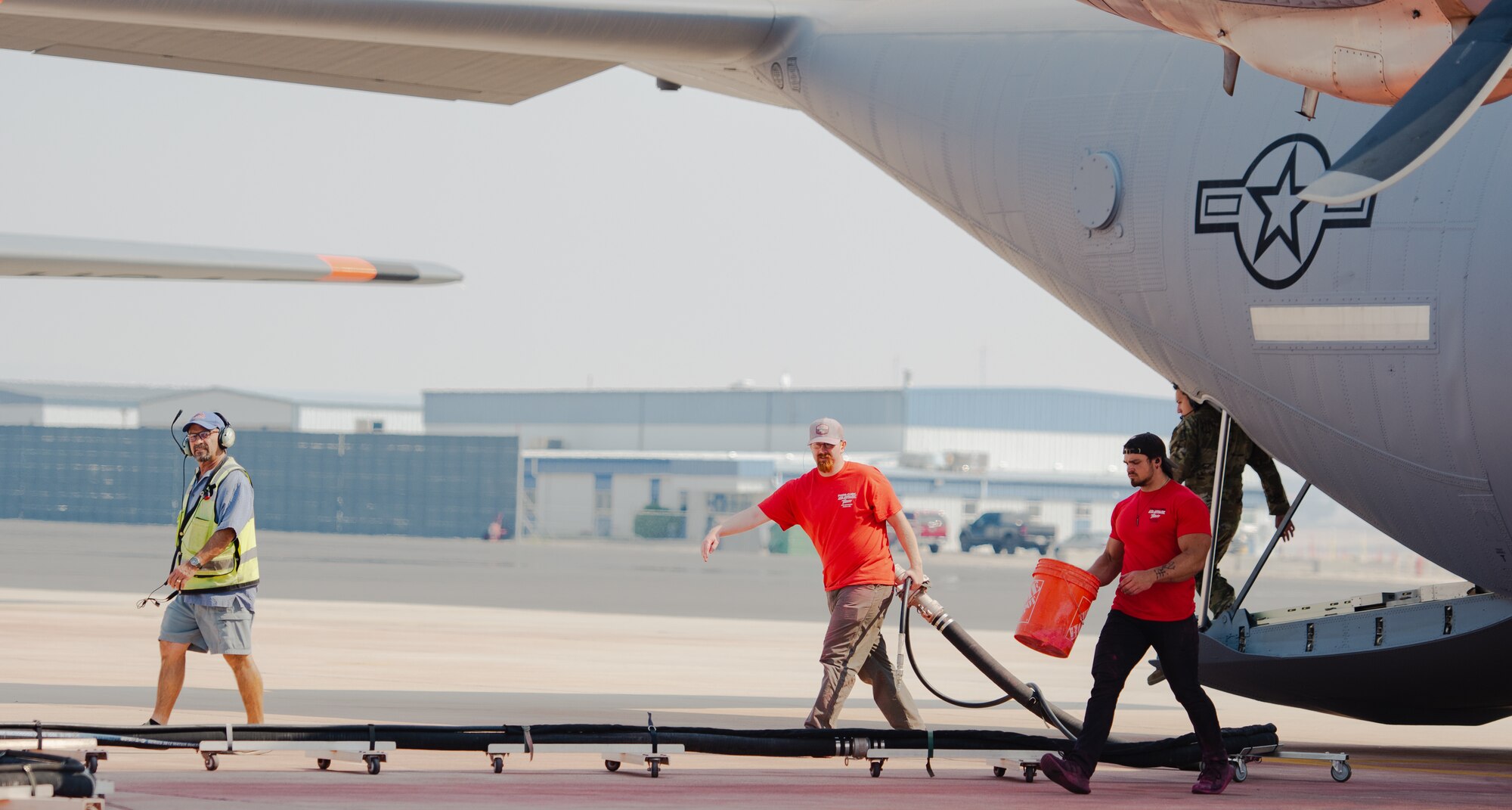 Photos showing Modular Airborne Firefighting System aircraft and crewmembers near Boise, Idaho.