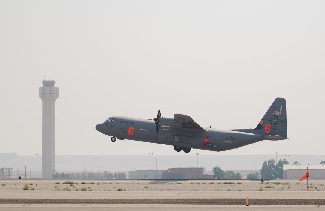 Photos showing Modular Airborne Firefighting System aircraft and crewmembers near Boise, Idaho.