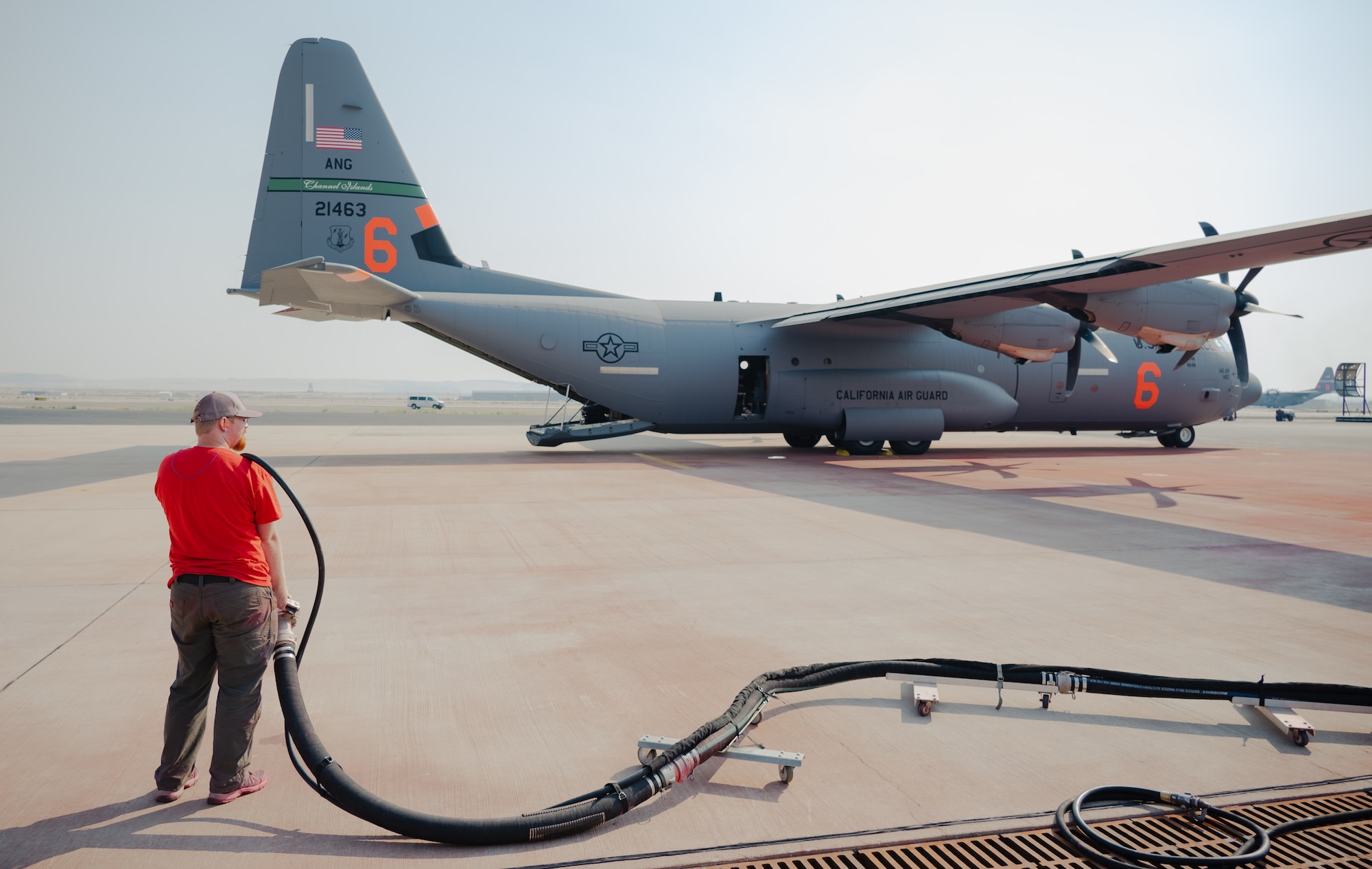 Photos showing Modular Airborne Firefighting System aircraft and crewmembers near Boise, Idaho.