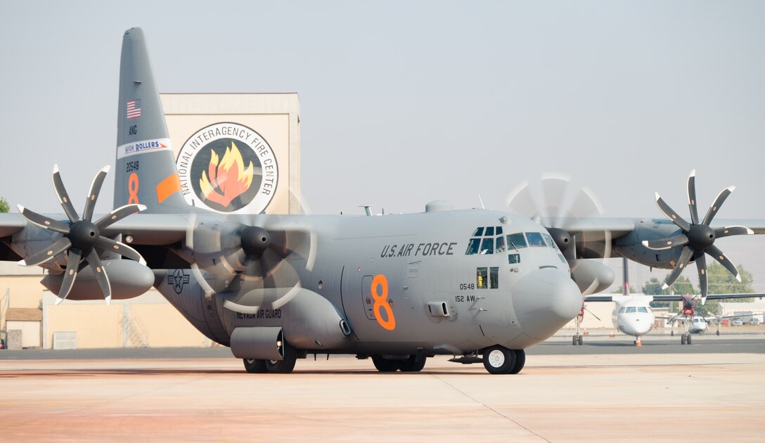 Photos showing Modular Airborne Firefighting System aircraft and crewmembers near Boise, Idaho.