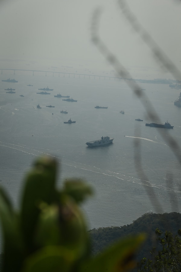 GUANABARA BAY, Brazil (Sept. 10, 2022) Ships from various military's wait to be reviewed by the President of Brazil Jair Bolsonaro during UNITAS LXIII, Sept. 10, 2022. UNITAS is the world’s longest-running maritime exercise. Hosted this year by Brazil, it brings together multinational forces from Belize, Brazil, Cameroon, Chile, Colombia, Dominican Republic, Ecuador, France, Guyana, Jamaica, Mexico, Namibia, Panama, Paraguay, Peru, South Korea, Spain, United Kingdom, Uruguay, and the United States conducting operations in and off the coast of Rio de Janeiro. The exercise trains forces to conduct joint maritime operations through the execution of anti-surface, anti-submarine, anti-air, amphibious and electronic warfare operations that enhance warfighting proficiency and increase interoperability among participating naval and marine forces. (U.S. Marine Corps photo by Cpl. Ethan Craw/Released)