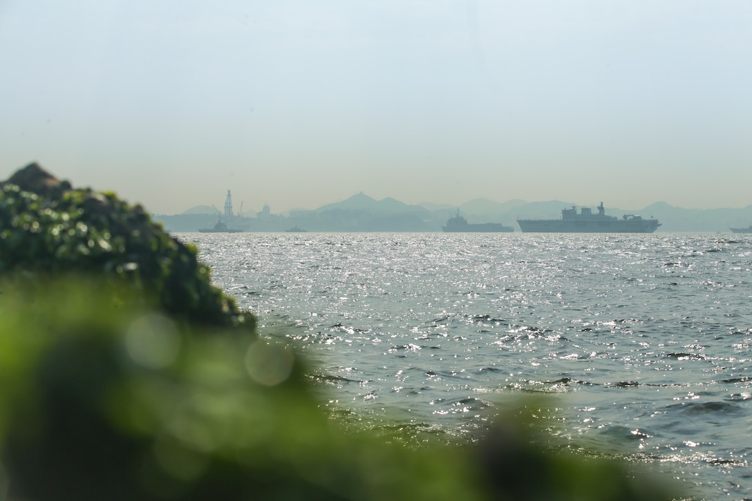 GUANABARA BAY, Brazil (Sept. 10, 2022) Ships from various military's wait to be reviewed by the President of Brazil Jair Bolsonaro during UNITAS LXIII, Sept. 10, 2022. UNITAS is the world’s longest-running maritime exercise. Hosted this year by Brazil, it brings together multinational forces from Belize, Brazil, Cameroon, Chile, Colombia, Dominican Republic, Ecuador, France, Guyana, Jamaica, Mexico, Namibia, Panama, Paraguay, Peru, South Korea, Spain, United Kingdom, Uruguay, and the United States conducting operations in and off the coast of Rio de Janeiro. The exercise trains forces to conduct joint maritime operations through the execution of anti-surface, anti-submarine, anti-air, amphibious and electronic warfare operations that enhance warfighting proficiency and increase interoperability among participating naval and marine forces. (U.S. Marine Corps photo by Cpl. Ethan Craw/Released)