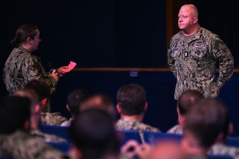 Master Chief Petty Officer of the Navy James Honea listens to a Sailor ask a question during an all-hands call at Joint Expeditionary Base Little Creek/Fort Story, Sept. 13, 2022.