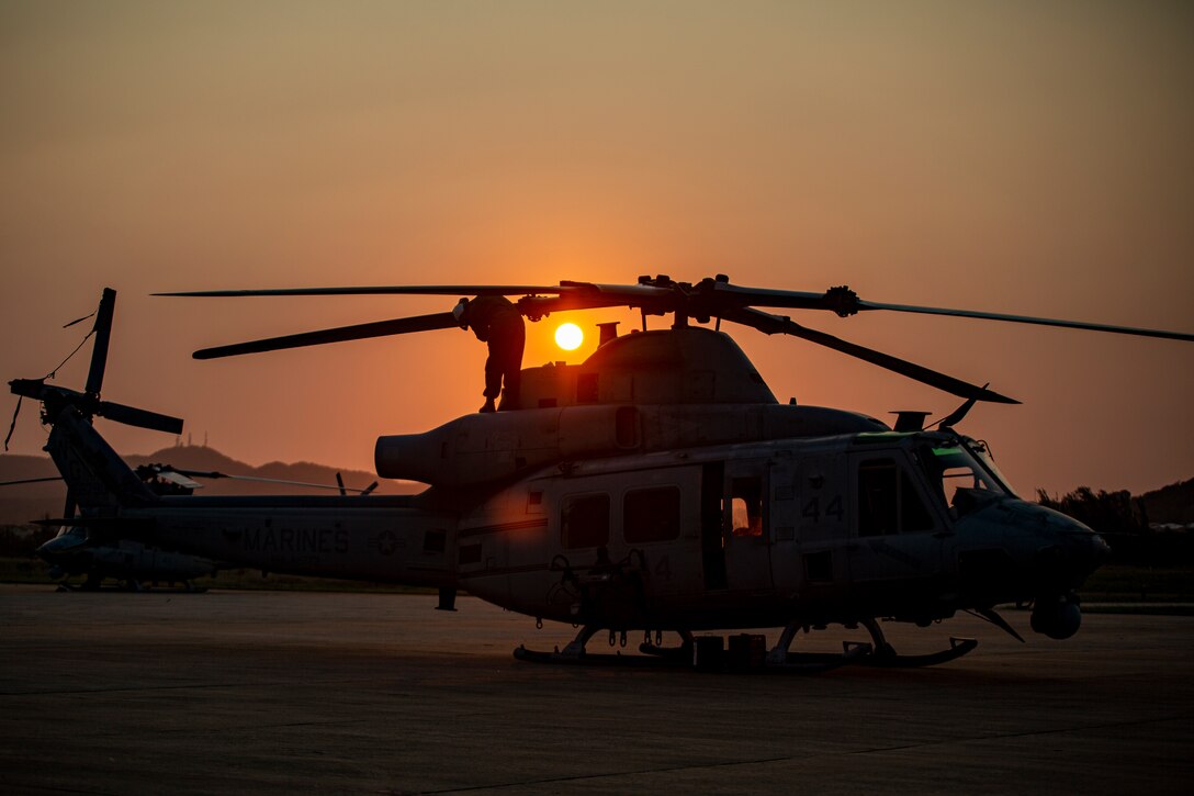 U.S. Marine Corps Cpl. Noah Helmuth, an airframes mechanic with Marine Light Attack Helicopter Squadron - 773, 4th Marine Aircraft Wing, Marine Forces Reserve, in support of Special Purpose Marine Air-Ground Task Force UNITAS LXIII, repairs the blade on a UH-1Y Venom at São Pedro da Aldeia, Brazil, during exercise UNITAS LXIII, Sept. 8, 2022. UNITAS is the world's longest-running annual multinational maritime exercise that focuses on enhancing interoperability among multiple nations and joint forces during littoral and amphibious operations in order to build on existing regional partnerships and create new enduring relationships that promote peace, stability and prosperity in the U.S. Southern Command’s area of responsibility. Helmuth is a native of West Covina, CA. (U.S. Marine Corps photo by 1st Lt. Mark L. Andries)