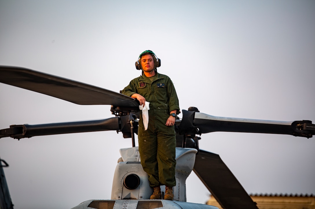U.S. Marine Corps Cpl. Noah Helmuth, an airframes mechanic with Marine Light Attack Helicopter Squadron - 773, 4th Marine Aircraft Wing, Marine Forces Reserve in support of Special Purpose Marine Air-Ground Task Force UNITAS LXIII, poses for a photo while on a UH-1Y Venom at São Pedro da Aldeia, Brazil, during exercise UNITAS LXIII, Sept. 8, 2022. UNITAS is the world's longest-running annual multinational maritime exercise that focuses on enhancing interoperability among multiple nations and joint forces during littoral and amphibious operations in order to build on existing regional partnerships and create new enduring relationships that promote peace, stability and prosperity in the U.S. Southern Command’s area of responsibility. Helmuth is a native of West Covina, CA. (U.S. Marine Corps photo by 1st Lt. Mark L. Andries)