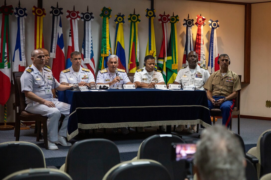U.S. Marine Corps Col. Guillermo Rosales, commander of Special Purpose Marine Air-Ground Task Force UNITAS LXIII, sits with Brazilian Navy leadership for a press conference after the opening ceremony of exercise UNITAS LXIII in Rio de Janeiro, Sept. 8, 2022. The opening ceremony recognized the official start of exercise UNITAS LXIII. UNITAS is the world's longest-running annual multinational maritime exercise that brings together forces from 19 countries to include Brazil, Cameroon, Chile, Colombia, Dominican Republic, Ecuador, France, Guyana, Jamaica, Mexico, Namibia, Panama, Paraguay, Peru, South Korea, Spain, United Kingdom, Uruguay, and the United States. The exercise focuses on enhancing interoperability among multiple nations and joint forces during littoral and amphibious operations in order to build on existing regional partnerships and create new enduring relationships that promote peace, stability and prosperity in the U.S. Southern Command’s area of responsibility. (U.S. Marine Corps photo by Sgt. Camila Melendez)