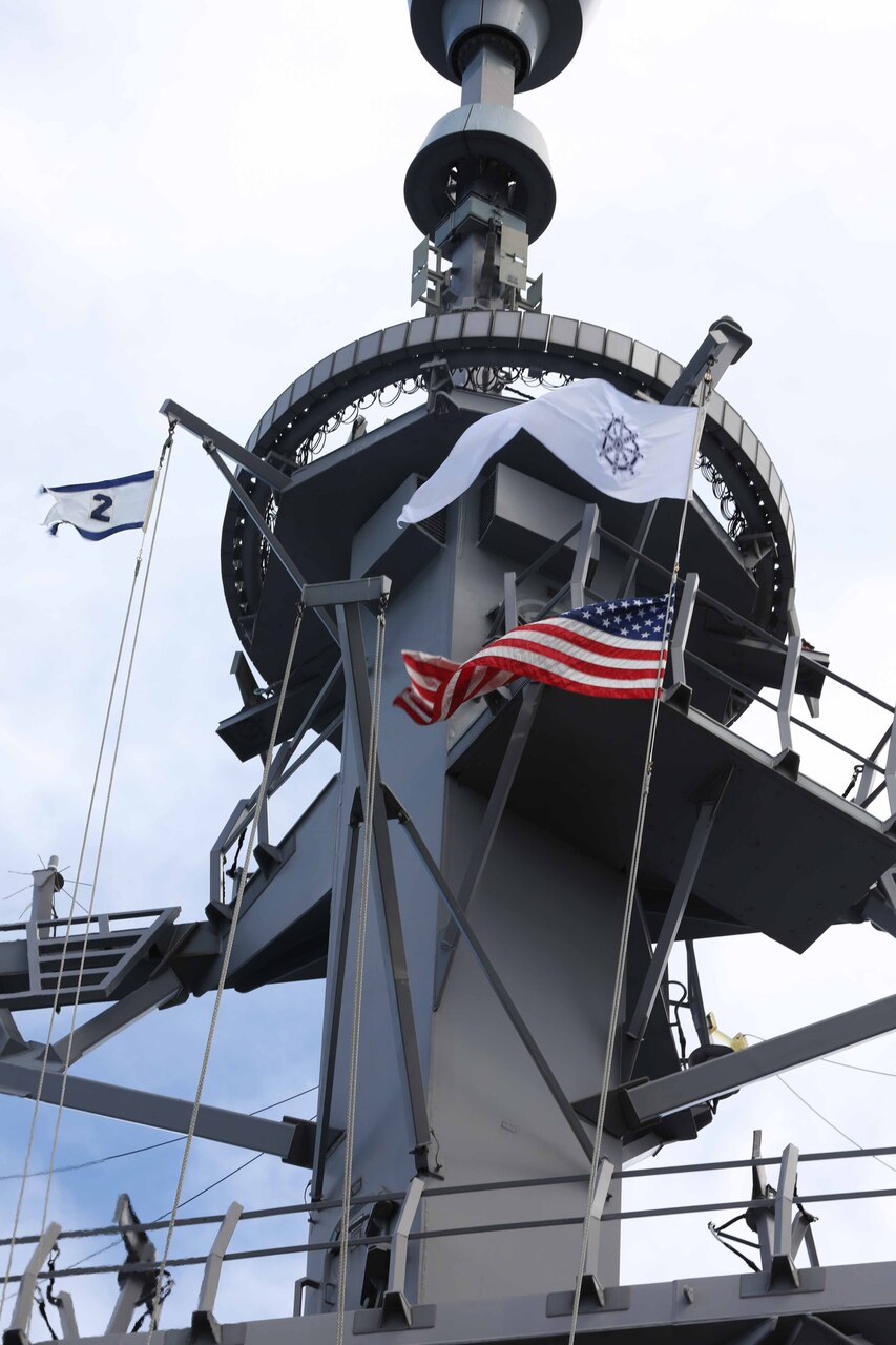 ATLANTIC OCEAN (Sept. 11, 2022) The Buddhist pennant flies for the first time in U.S. Navy history onboard the guided-missile destroyer USS McFaul (DDG 74), Sept. 11.  The pennant flew during a Buddhist Dharma service, led by Navy Chaplain Lt. Saejeong Kim. U.S. Flag code stipulates that any church pennant be flown immediately above the ensign when a chaplain conducts religious services underway. (U.S. Navy photo by Mass Communication Specialist 3rd Class Kerri Kline)