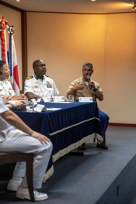 U.S. Marine Corps Col. Guillermo Rosales, commander of Special Purpose Marine Air-Ground Task Force UNITAS LXIII, speaks with Brazilian Navy leadership during a press conference after the opening ceremony of exercise UNITAS LXIII in Rio de Janeiro, Sept. 8, 2022. The opening ceremony recognized the official start of exercise UNITAS LXIII. UNITAS is the world's longest-running annual multinational maritime exercise that brings together forces from 19 countries to include Brazil, Cameroon, Chile, Colombia, Dominican Republic, Ecuador, France, Guyana, Jamaica, Mexico, Namibia, Panama, Paraguay, Peru, South Korea, Spain, United Kingdom, Uruguay, and the United States. The exercise focuses on enhancing interoperability among multiple nations and joint forces during littoral and amphibious operations in order to build on existing regional partnerships and create new enduring relationships that promote peace, stability and prosperity in the U.S. Southern Command’s area of responsibility. (U.S. Marine Corps photo by Sgt. Camila Melendez)