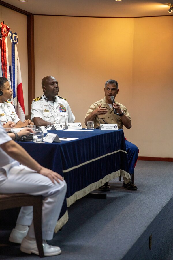 U.S. Marine Corps Col. Guillermo Rosales, commander of Special Purpose Marine Air-Ground Task Force UNITAS LXIII, speaks with Brazilian Navy leadership during a press conference after the opening ceremony of exercise UNITAS LXIII in Rio de Janeiro, Sept. 8, 2022. The opening ceremony recognized the official start of exercise UNITAS LXIII. UNITAS is the world's longest-running annual multinational maritime exercise that brings together forces from 19 countries to include Brazil, Cameroon, Chile, Colombia, Dominican Republic, Ecuador, France, Guyana, Jamaica, Mexico, Namibia, Panama, Paraguay, Peru, South Korea, Spain, United Kingdom, Uruguay, and the United States. The exercise focuses on enhancing interoperability among multiple nations and joint forces during littoral and amphibious operations in order to build on existing regional partnerships and create new enduring relationships that promote peace, stability and prosperity in the U.S. Southern Command’s area of responsibility. (U.S. Marine Corps photo by Sgt. Camila Melendez)