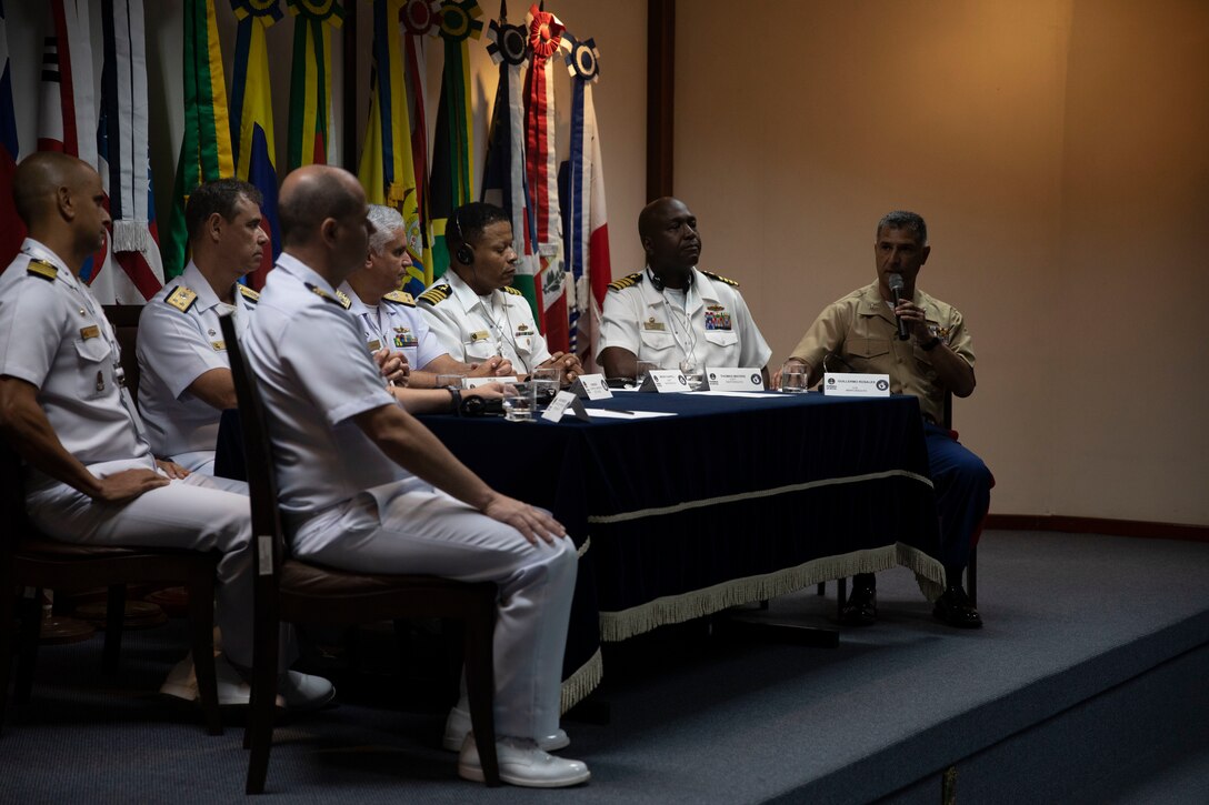 U.S. Marine Corps Col. Guillermo Rosales, commander of Special Purpose Marine Air-Ground Task Force UNITAS LXIII, speaks with Brazilian Navy leadership during a press conference after the opening ceremony of exercise UNITAS LXIII in Rio de Janeiro, Sept. 8, 2022. The opening ceremony recognized the official start of exercise UNITAS LXIII. UNITAS is the world's longest-running annual multinational maritime exercise that brings together forces from 19 countries to include Brazil, Cameroon, Chile, Colombia, Dominican Republic, Ecuador, France, Guyana, Jamaica, Mexico, Namibia, Panama, Paraguay, Peru, South Korea, Spain, United Kingdom, Uruguay, and the United States. The exercise focuses on enhancing interoperability among multiple nations and joint forces during littoral and amphibious operations in order to build on existing regional partnerships and create new enduring relationships that promote peace, stability and prosperity in the U.S. Southern Command’s area of responsibility. (U.S. Marine Corps photo by Sgt. Camila Melendez)