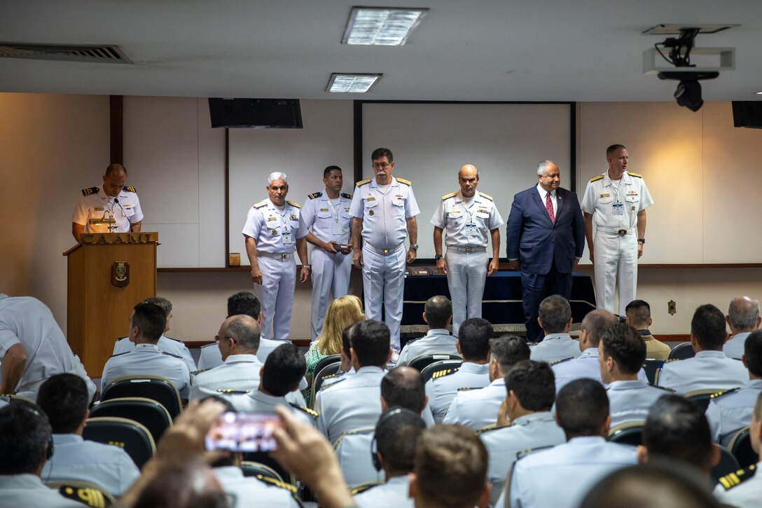 U.S. Secretary of the Navy Carlos Del Toro stands with Brazilian Navy leadership during the opening ceremony of exercise UNITAS LXIII in Rio de Janeiro, Sept. 8, 2022. The opening ceremony recognized the official start of exercise UNITAS LXIII. UNITAS is the world's longest-running annual multinational maritime exercise that brings together forces from 19 countries to include Brazil, Cameroon, Chile, Colombia, Dominican Republic, Ecuador, France, Guyana, Jamaica, Mexico, Namibia, Panama, Paraguay, Peru, South Korea, Spain, United Kingdom, Uruguay, and the United States. The exercise focuses on enhancing interoperability among multiple nations and joint forces during littoral and amphibious operations in order to build on existing regional partnerships and create new enduring relationships that promote peace, stability and prosperity in the U.S. Southern Command’s area of responsibility. (U.S. Marine Corps photo by Sgt. Camila Melendez)