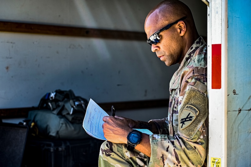 A U.S. Army Soldier assigned to the 404th Civil Affairs Battalion, prepares jump packs for an Airborne operation at Joint Base McGuire-Dix-Lakehurst, N.J. on Sept. 10, 2022. The unit conducted non-tactical airborne operations at the Army Aviation Facility in order to maintain mission readiness and proficiency among their paratroopers with the assistance of two CH-47’s out of Virginia.The Army Aviation Facility was created through a MILCON effort valued at 11.7 million dollars and made possible by the joint effort of ASA Fort Dix and the U.S. Marine Corps Marine Aircraft Group 49. The 2100 square foot building is host to an Army Ramp Management Area which provides a wide range of capabilities for both fixed and rotary wing aircraft such as the C-130, CH-47S, and UH-60S.