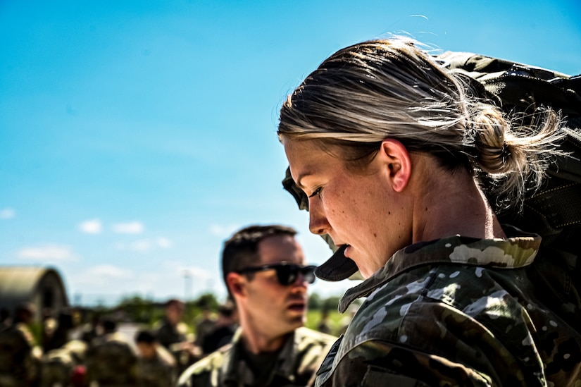 A U.S. Army Soldier assigned to the 404th Civil Affairs Battalion, prepares jump packs for an Airborne operation at Joint Base McGuire-Dix-Lakehurst, N.J. on Sept. 10, 2022. The unit conducted non-tactical airborne operations at the Army Aviation Facility in order to maintain mission readiness and proficiency among their paratroopers with the assistance of two CH-47’s out of Virginia.The Army Aviation Facility was created through a MILCON effort valued at 11.7 million dollars and made possible by the joint effort of ASA Fort Dix and the U.S. Marine Corps Marine Aircraft Group 49. The 2100 square foot building is host to an Army Ramp Management Area which provides a wide range of capabilities for both fixed and rotary wing aircraft such as the C-130, CH-47S, and UH-60S.