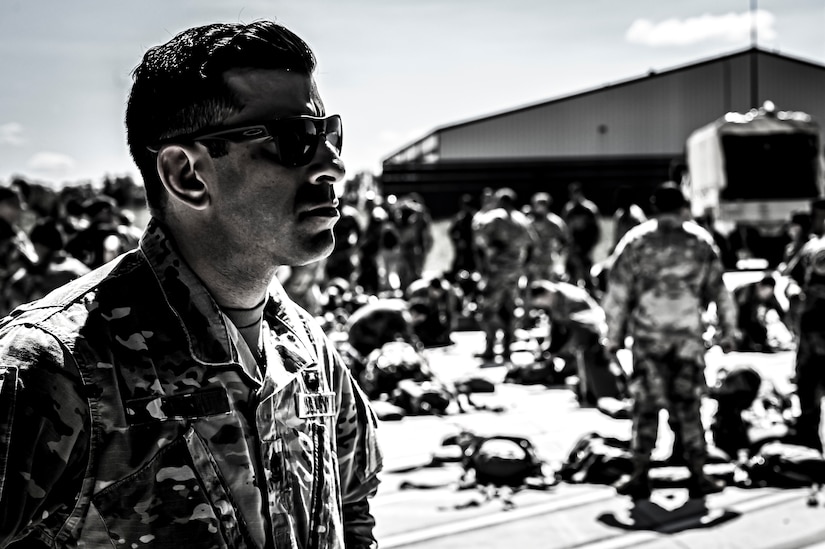 A U.S. Army Soldier assigned to the 404th Civil Affairs Battalion, prepares jump packs for an Airborne operation at Joint Base McGuire-Dix-Lakehurst, N.J. on Sept. 10, 2022. The unit conducted non-tactical airborne operations at the Army Aviation Facility in order to maintain mission readiness and proficiency among their paratroopers with the assistance of two CH-47’s out of Virginia.The Army Aviation Facility was created through a MILCON effort valued at 11.7 million dollars and made possible by the joint effort of ASA Fort Dix and the U.S. Marine Corps Marine Aircraft Group 49. The 2100 square foot building is host to an Army Ramp Management Area which provides a wide range of capabilities for both fixed and rotary wing aircraft such as the C-130, CH-47S, and UH-60S.