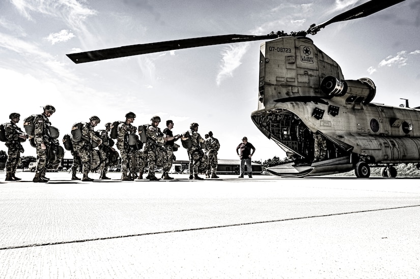 U.S. Army Soldiers assigned to the 404th Civil Affairs Battalion, board a CH-47 for an Airborne operation at Joint Base McGuire-Dix-Lakehurst, N.J. on Sept. 10, 2022. The unit conducted non-tactical airborne operations at the Army Aviation Facility in order to maintain mission readiness and proficiency among their paratroopers with the assistance of two CH-47’s out of Virginia.The Army Aviation Facility was created through a MILCON effort valued at 11.7 million dollars and made possible by the joint effort of ASA Fort Dix and the U.S. Marine Corps Marine Aircraft Group 49. The 2100 square foot building is host to an Army Ramp Management Area which provides a wide range of capabilities for both fixed and rotary wing aircraft such as the C-130, CH-47S, and UH-60S.